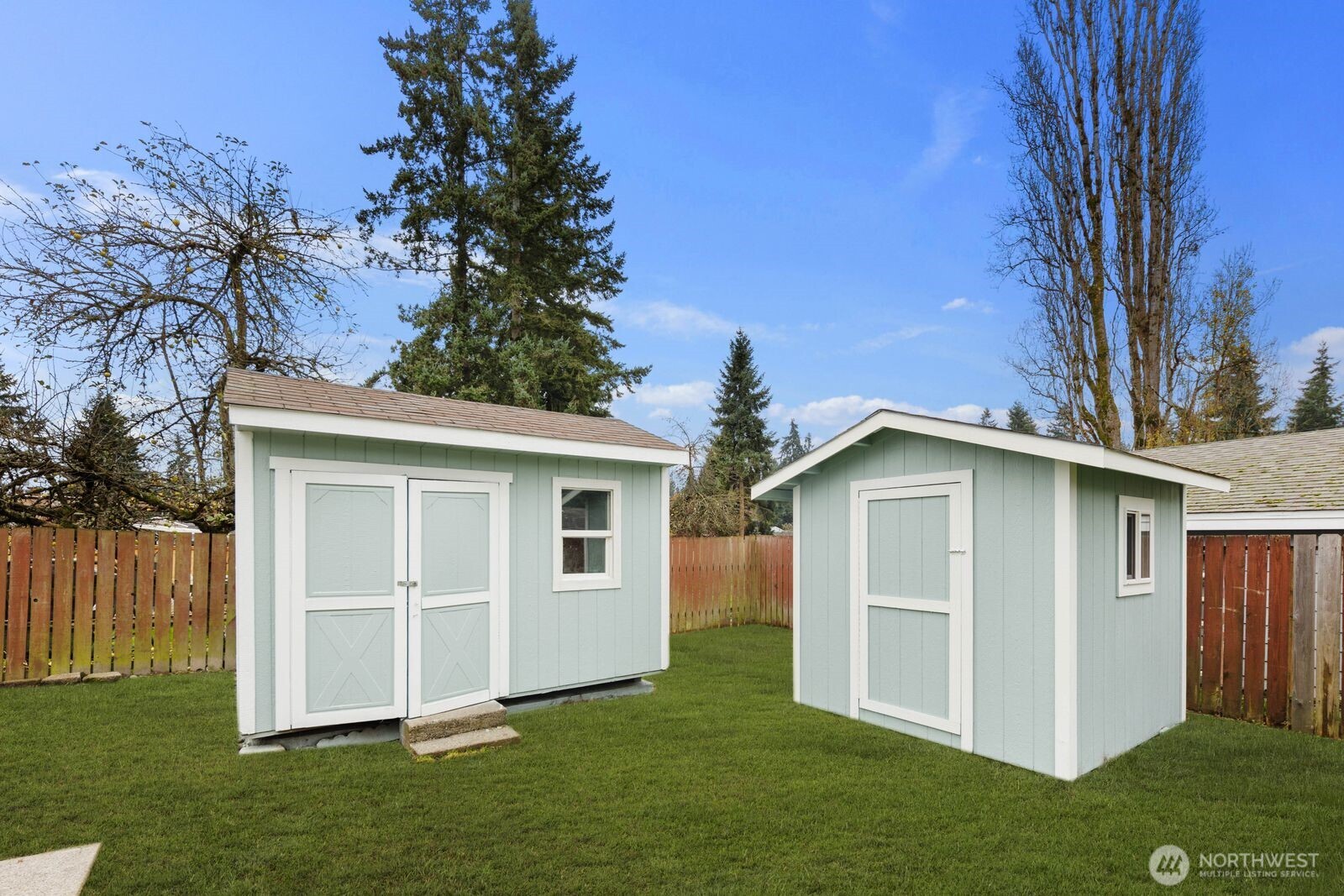 505 Southwest 305th Street Federal Way, WA 98023 - Photo 24 of 38 a white house that has tree in front of it