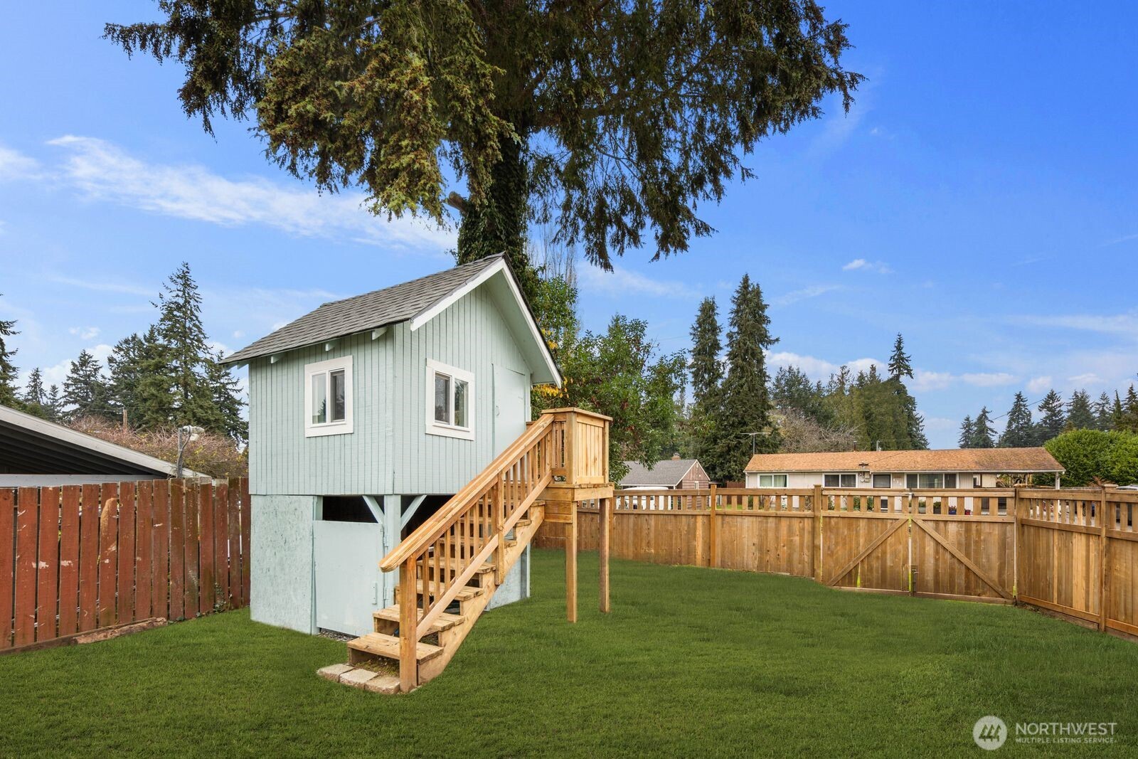 505 Southwest 305th Street Federal Way, WA 98023 - Photo 26 of 38 a view of a house with a yard