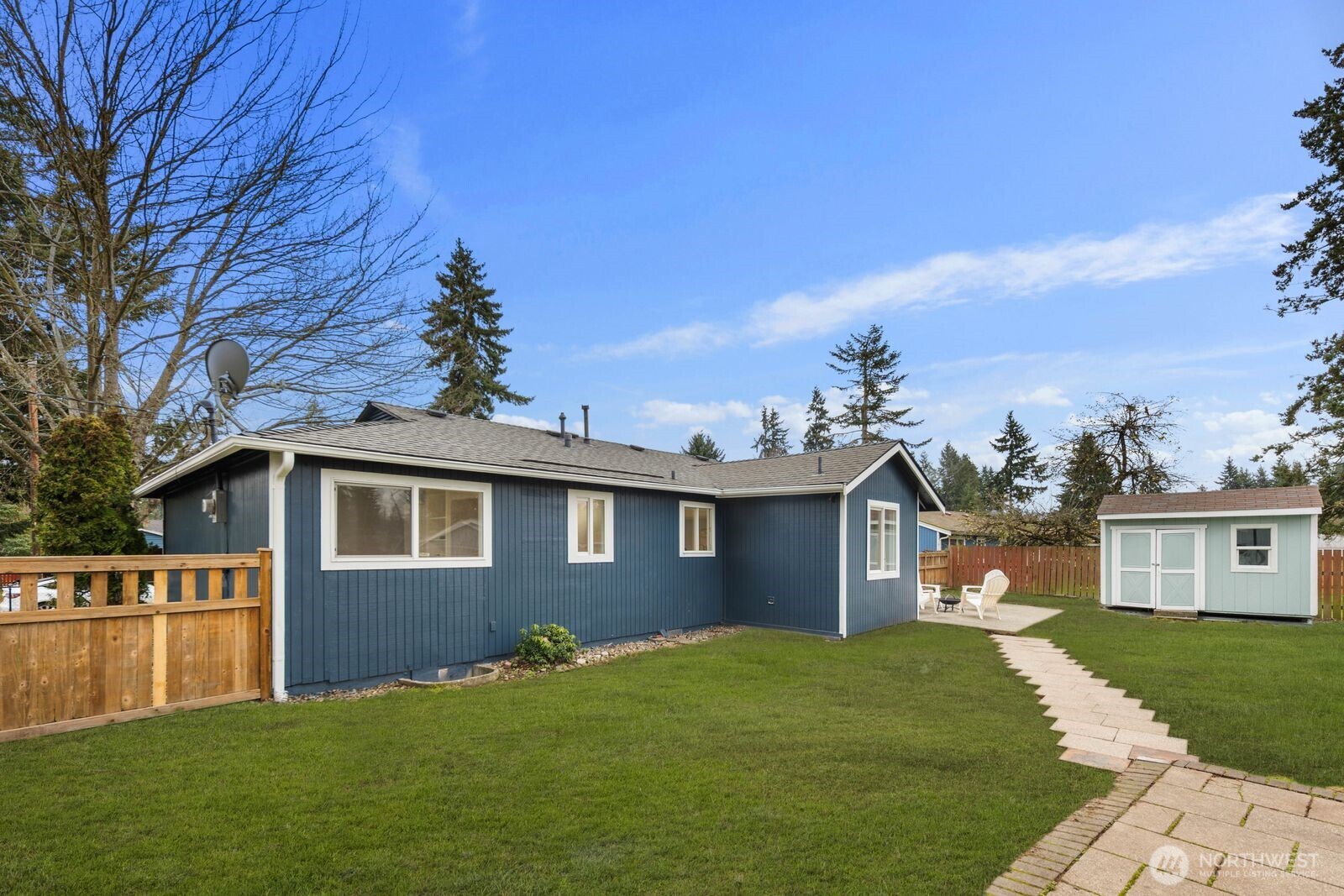 505 Southwest 305th Street Federal Way, WA 98023 - Photo 29 of 38 a front view of a house with a garden