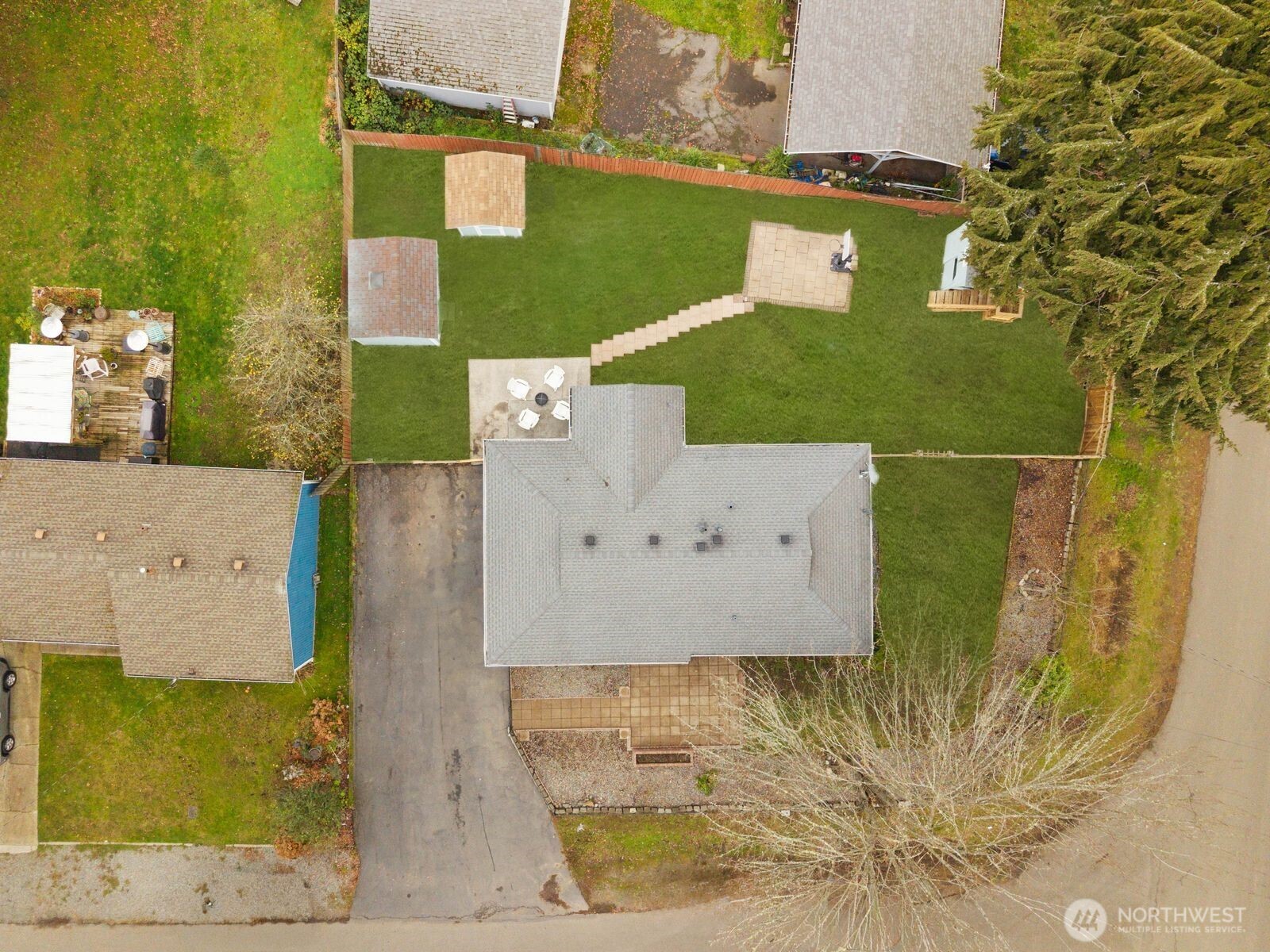 505 Southwest 305th Street Federal Way, WA 98023 - Photo 33 of 38 an aerial view of a house with a yard