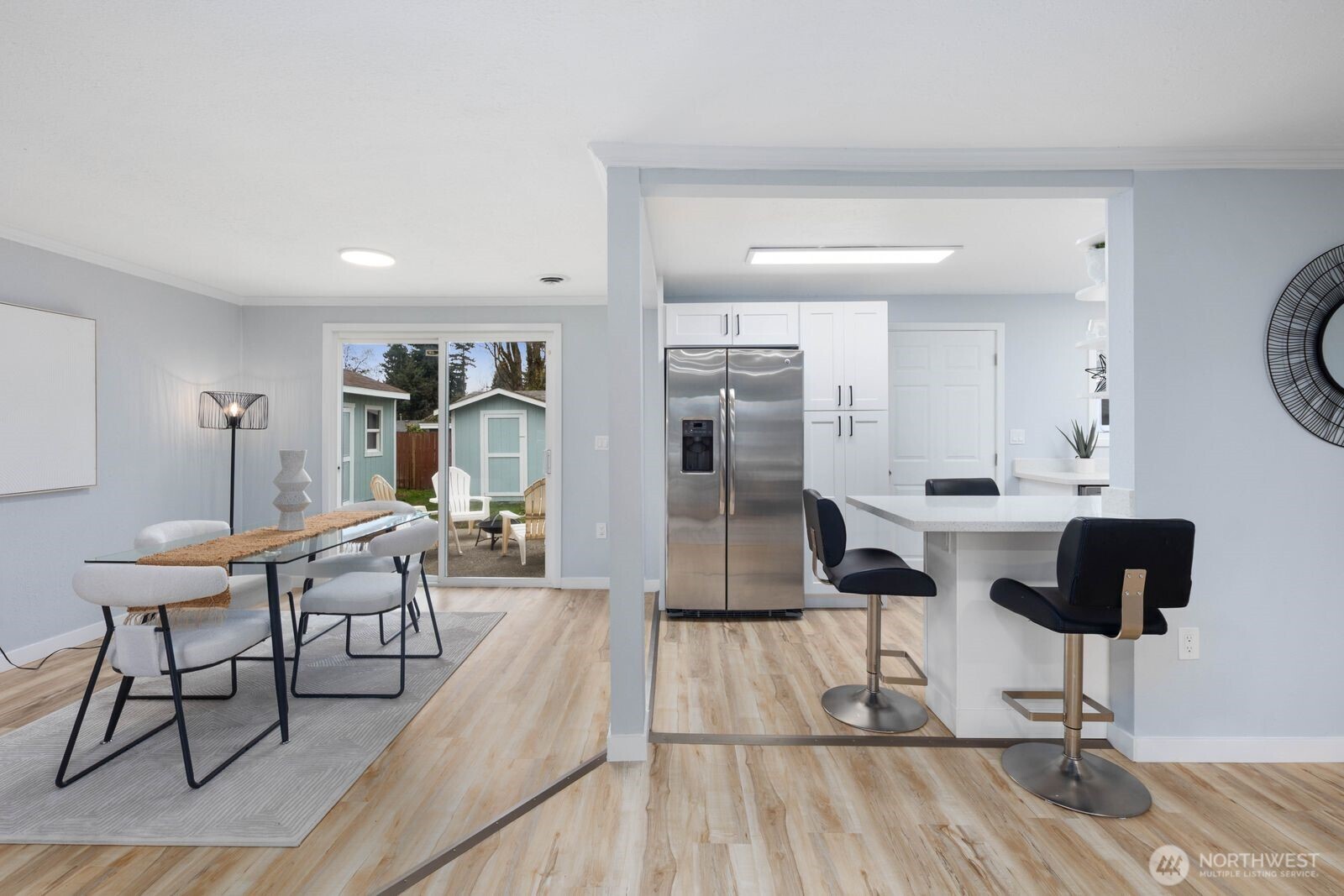 505 Southwest 305th Street Federal Way, WA 98023 - Photo 7 of 38 a living room with furniture and wooden floor