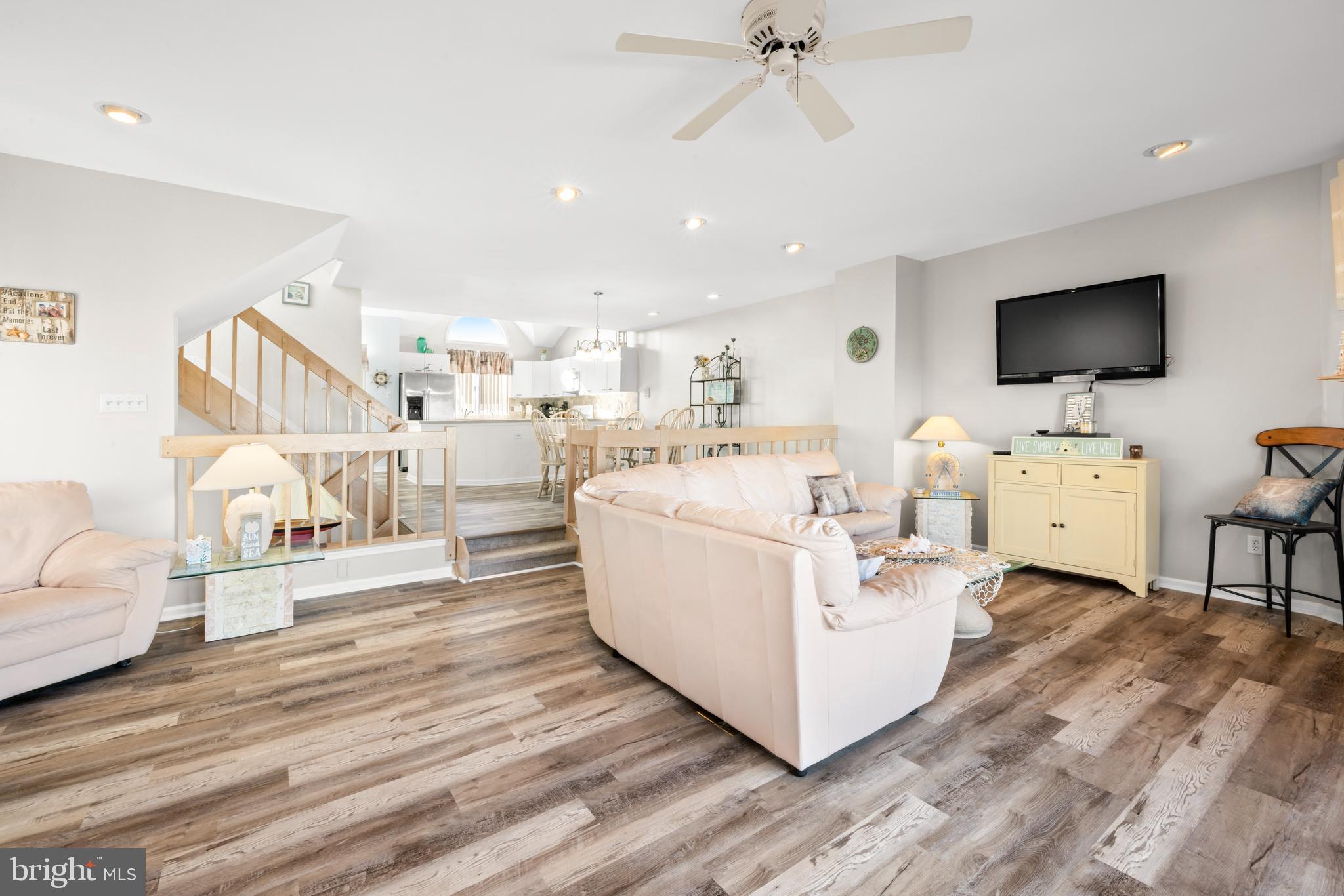 313 Gull Cove Brigantine, NJ 08203 - Photo 13 of 34 a living room with furniture and a flat screen tv