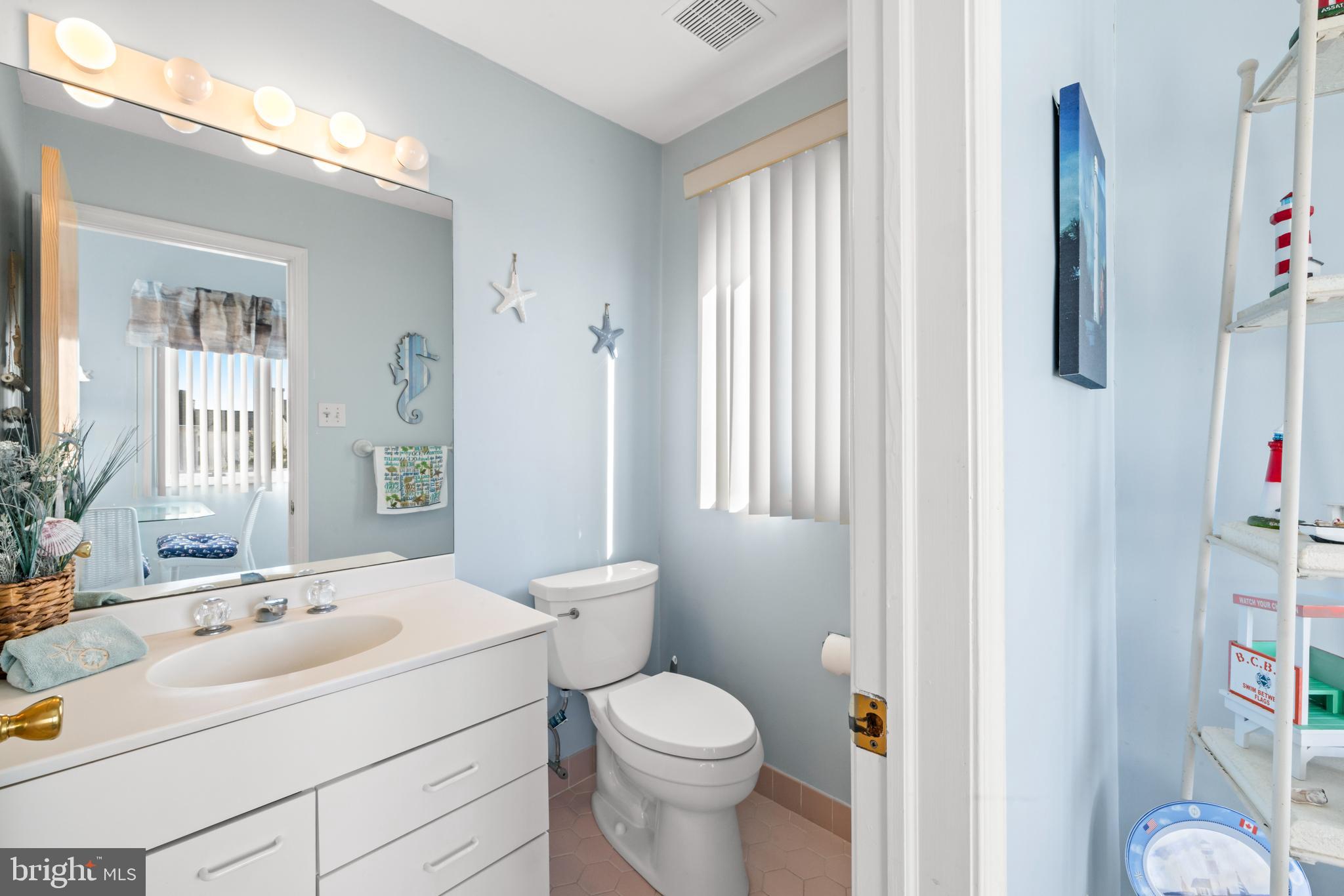 313 Gull Cove Brigantine, NJ 08203 - Photo 18 of 34 a bathroom with a sink toilet and shower