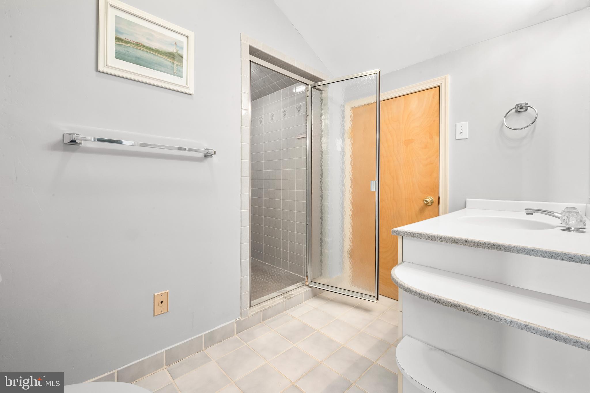 313 Gull Cove Brigantine, NJ 08203 - Photo 26 of 34 a bathroom with a sink and a shower