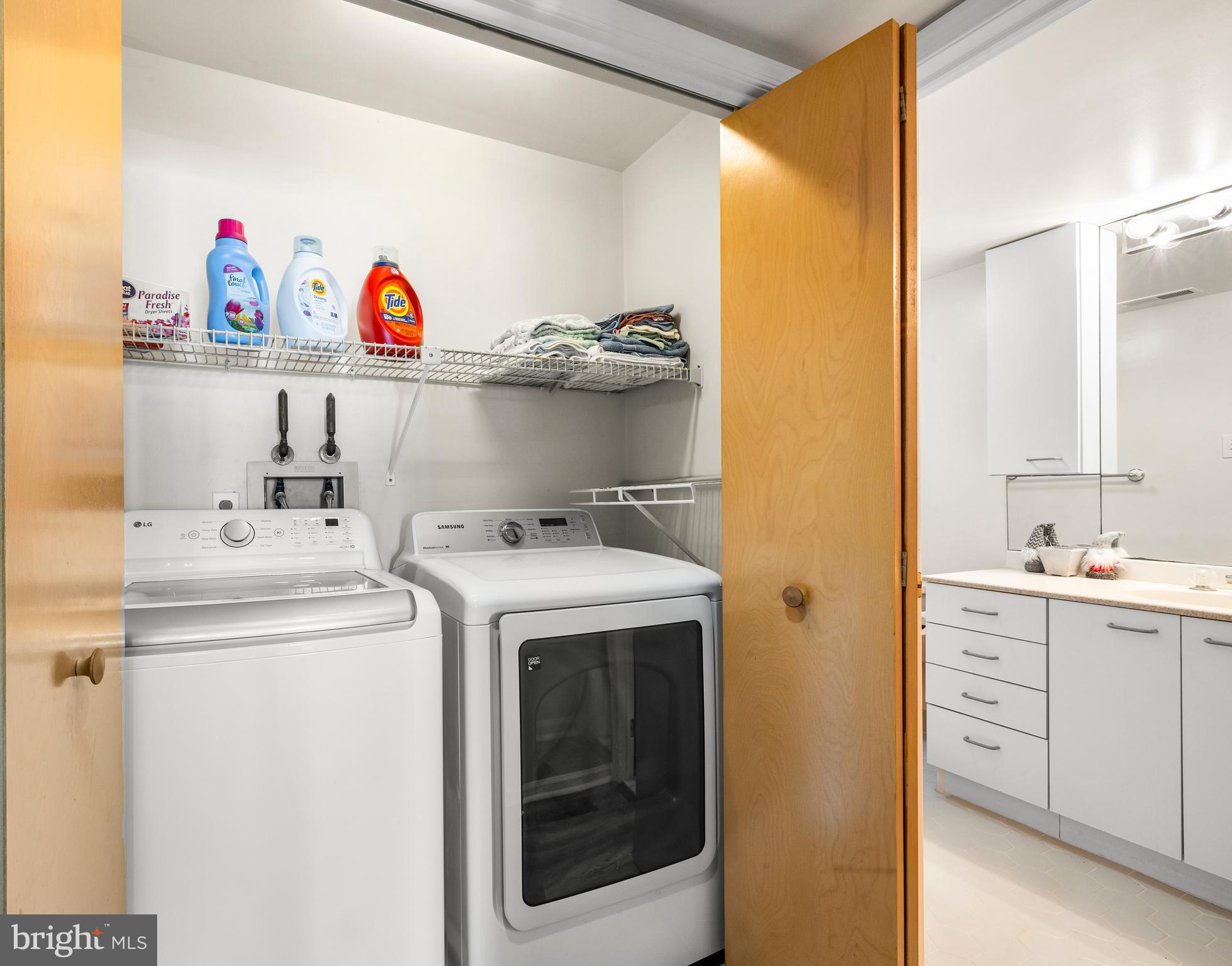 313 Gull Cove Brigantine, NJ 08203 - Photo 29 of 34 a utility room with dryer and washer