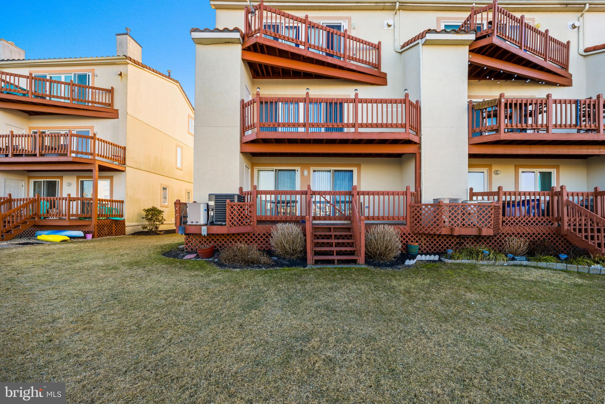 313 Gull Cove Brigantine, NJ 08203 - Photo 3 of 34 a view of a house with a yard and sitting area