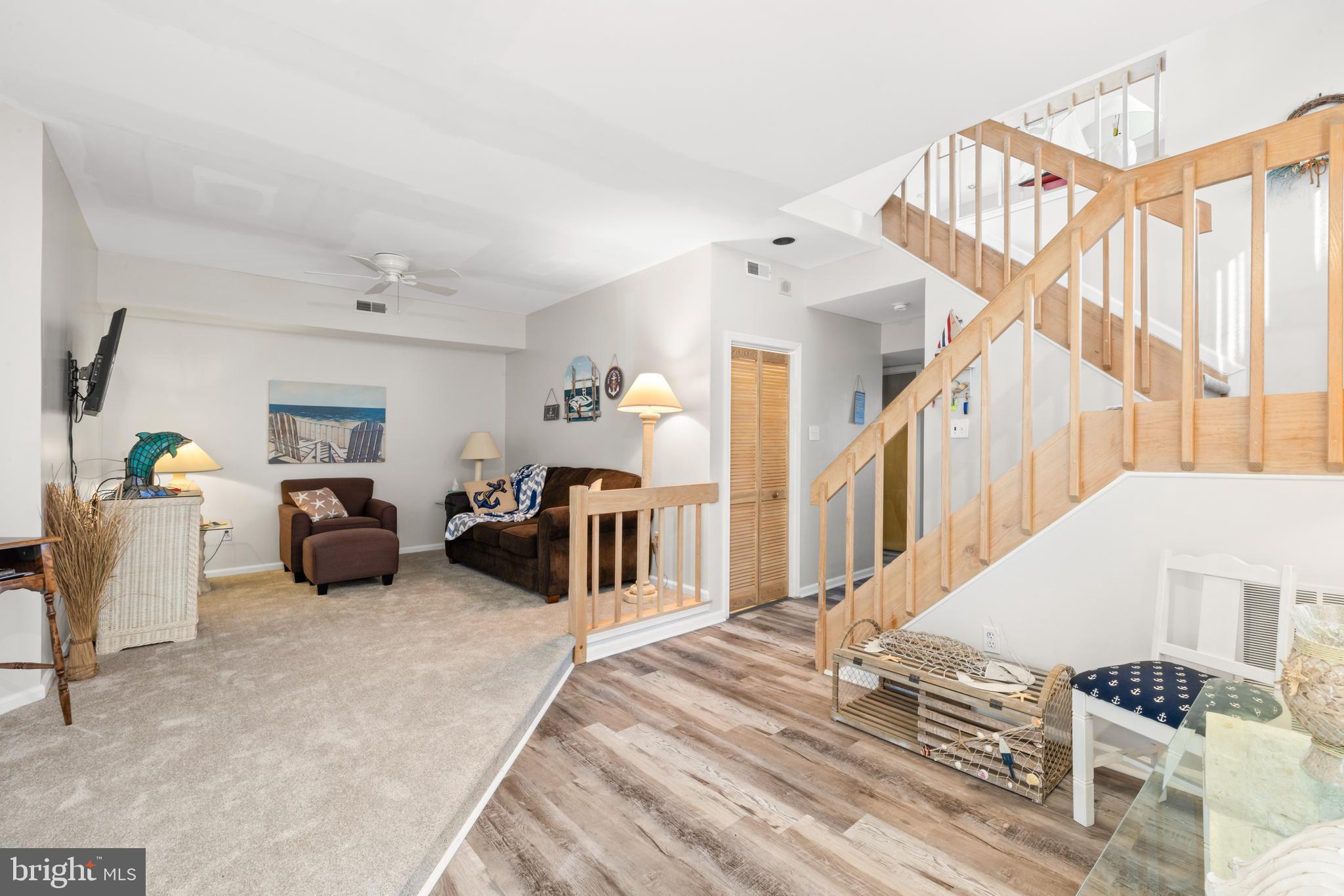 313 Gull Cove Brigantine, NJ 08203 - Photo 4 of 34 a bedroom with furniture and a wooden floor