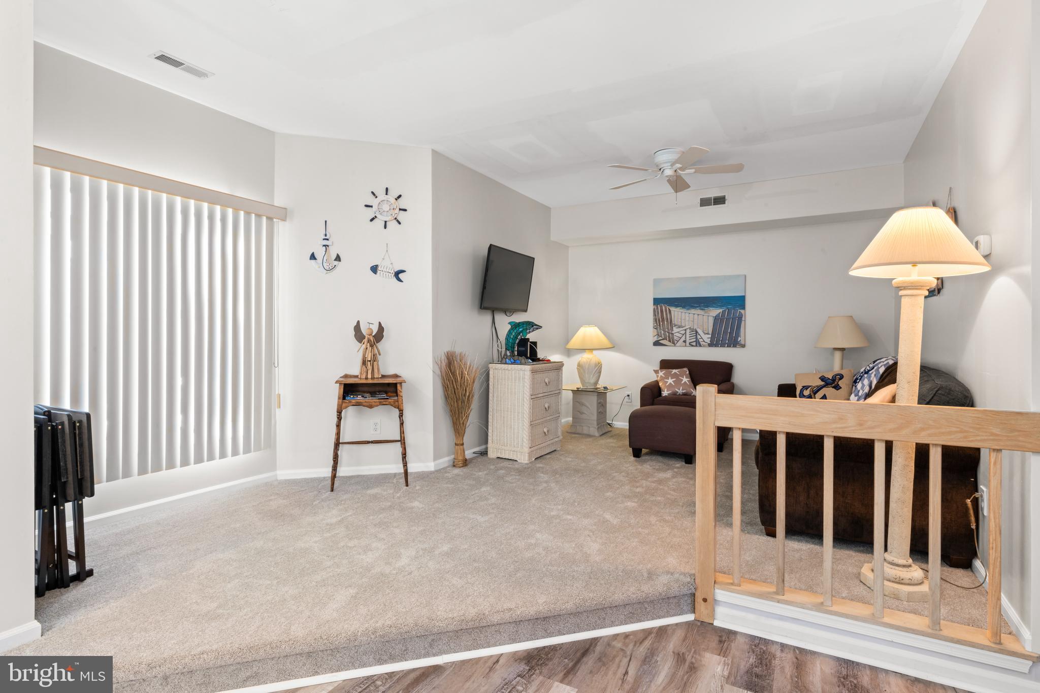 313 Gull Cove Brigantine, NJ 08203 - Photo 5 of 34 a living room with furniture and a window