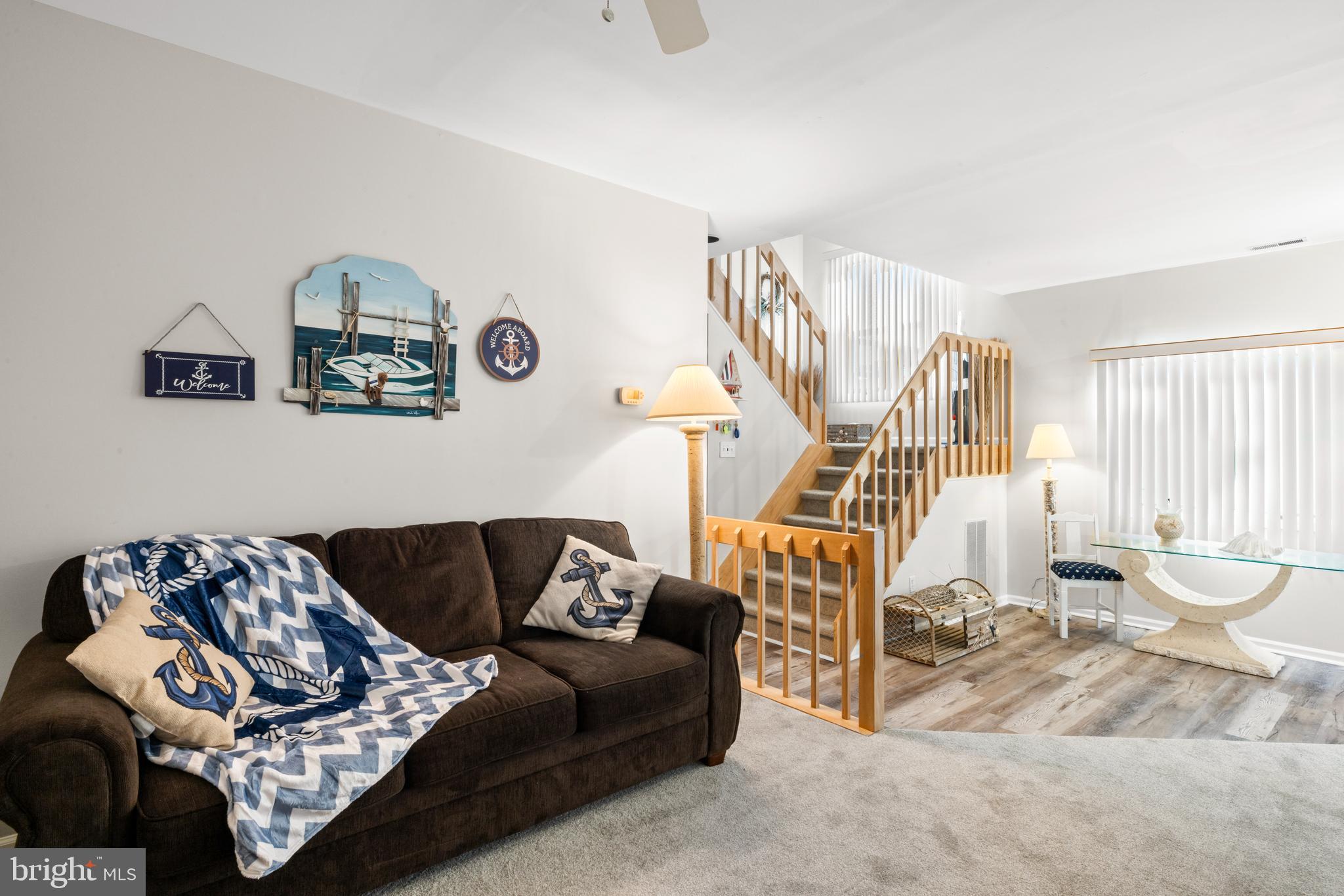 313 Gull Cove Brigantine, NJ 08203 - Photo 6 of 34 a living room with furniture and a wooden floor