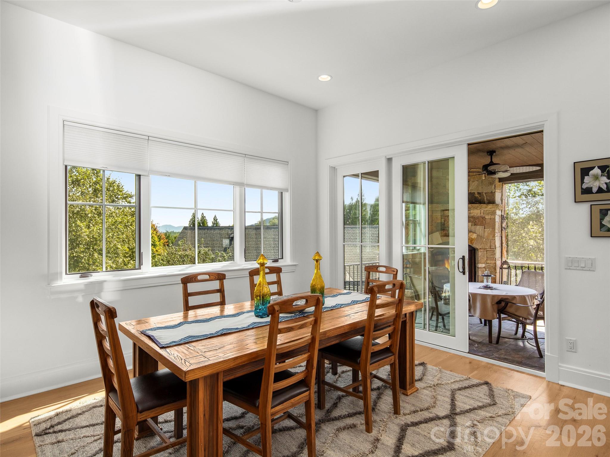 4 Windelsham Way Arden, NC 28704 - Photo 16 of 46 a view of a dining room with furniture window and outside view
