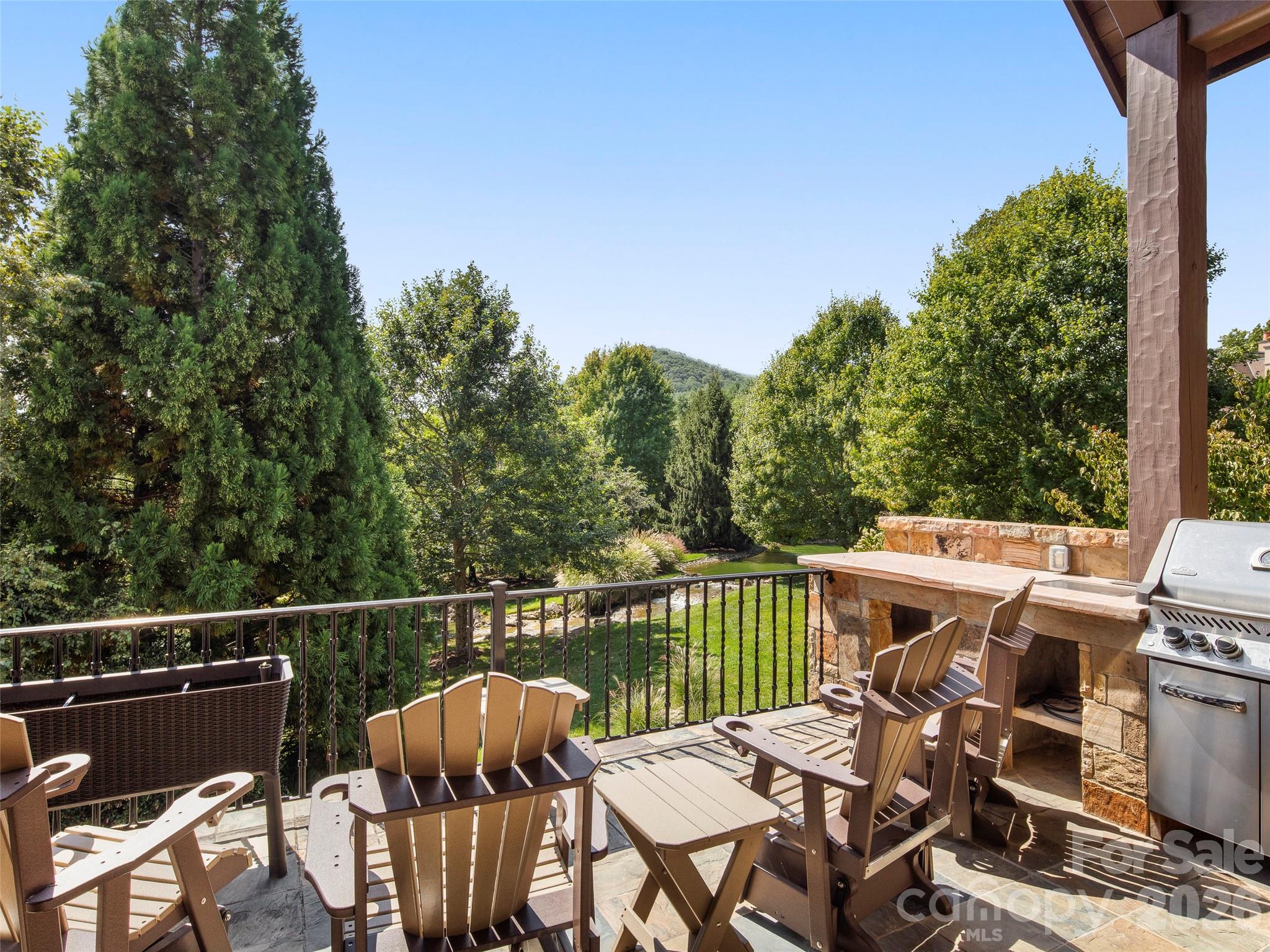 4 Windelsham Way Arden, NC 28704 - Photo 20 of 46 a view of a deck with a patio