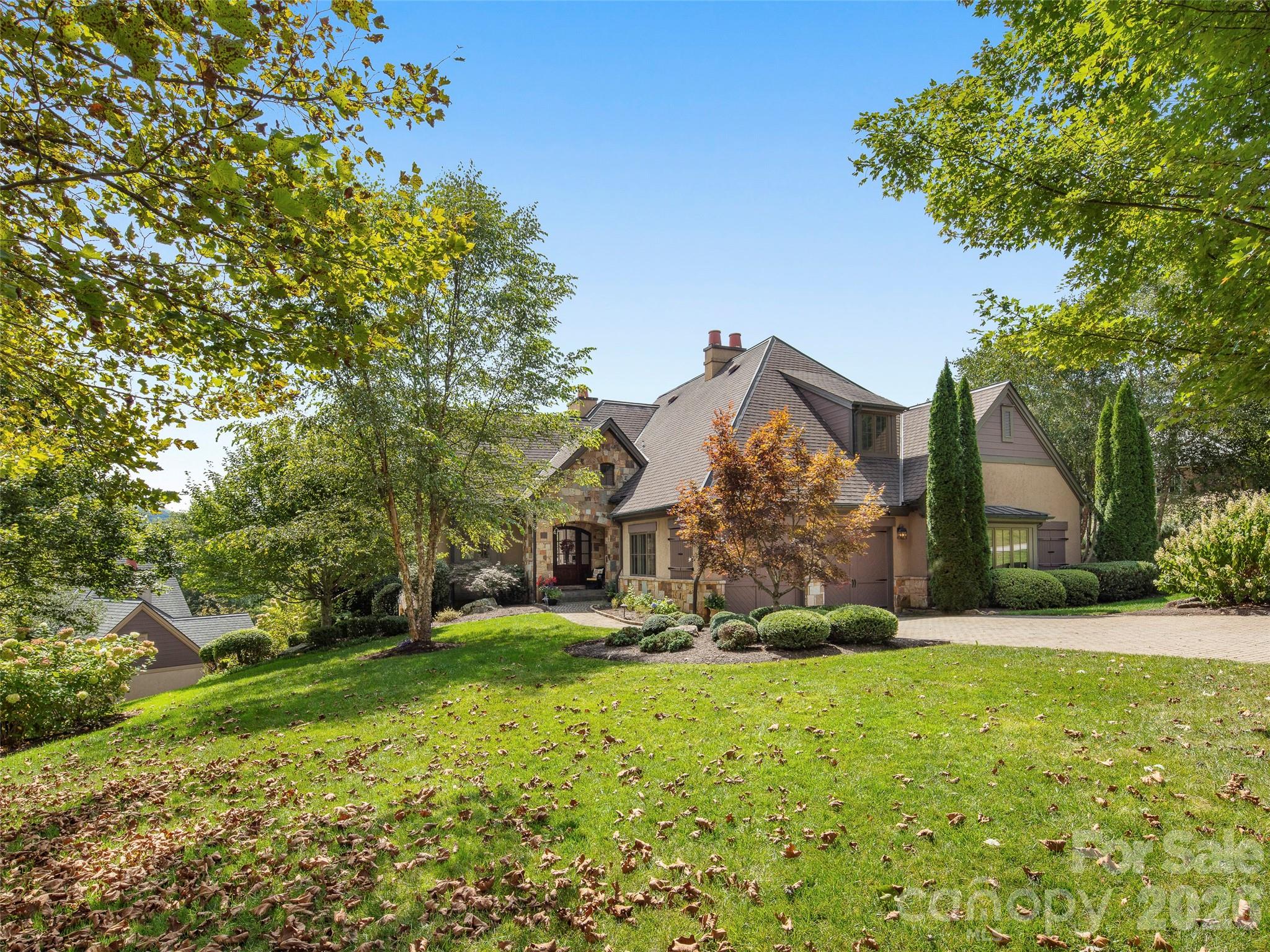 4 Windelsham Way Arden, NC 28704 - Photo 2 of 46 a view of a house with a yard