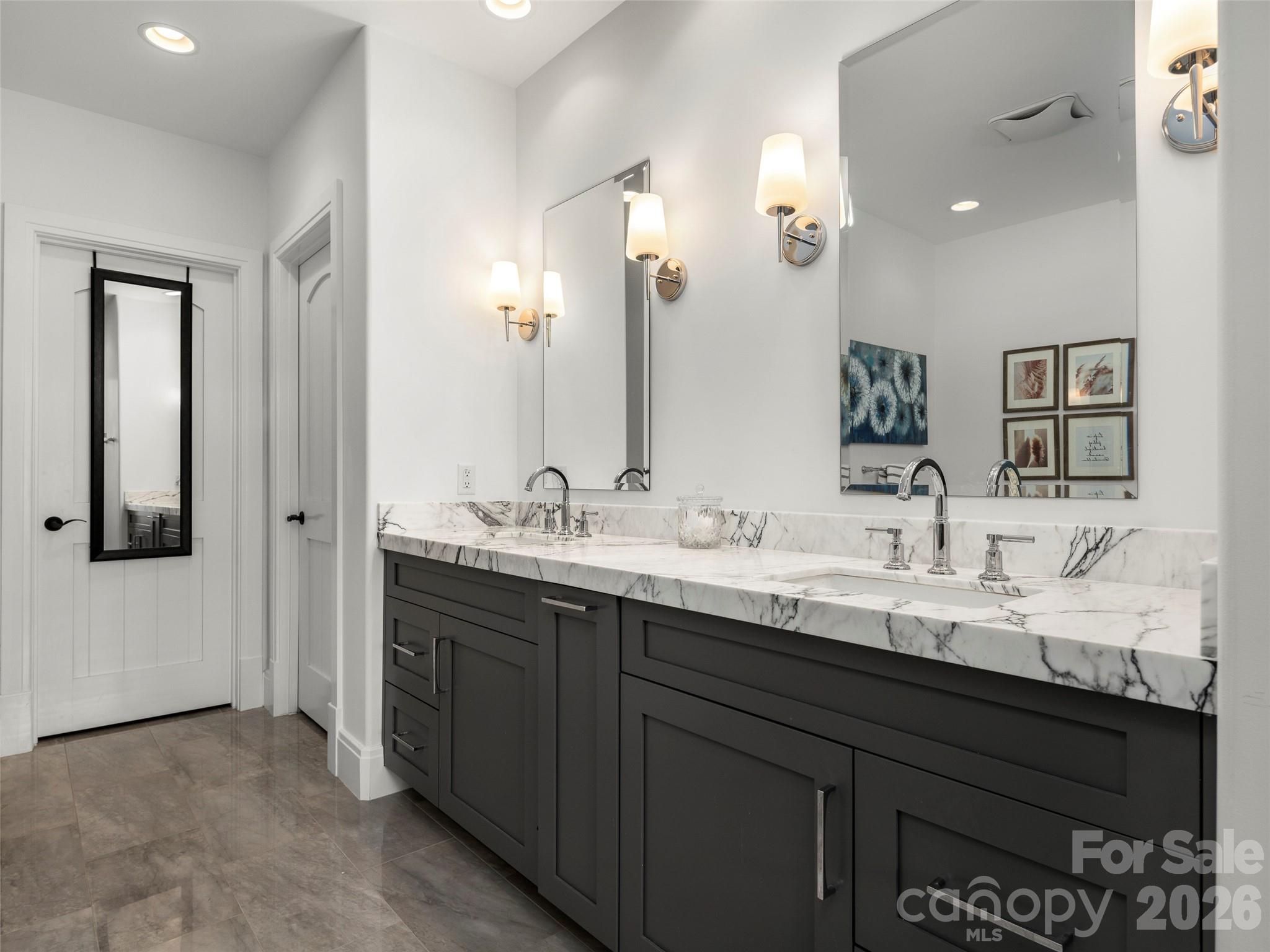 4 Windelsham Way Arden, NC 28704 - Photo 25 of 46 a bathroom with double sink and a mirror