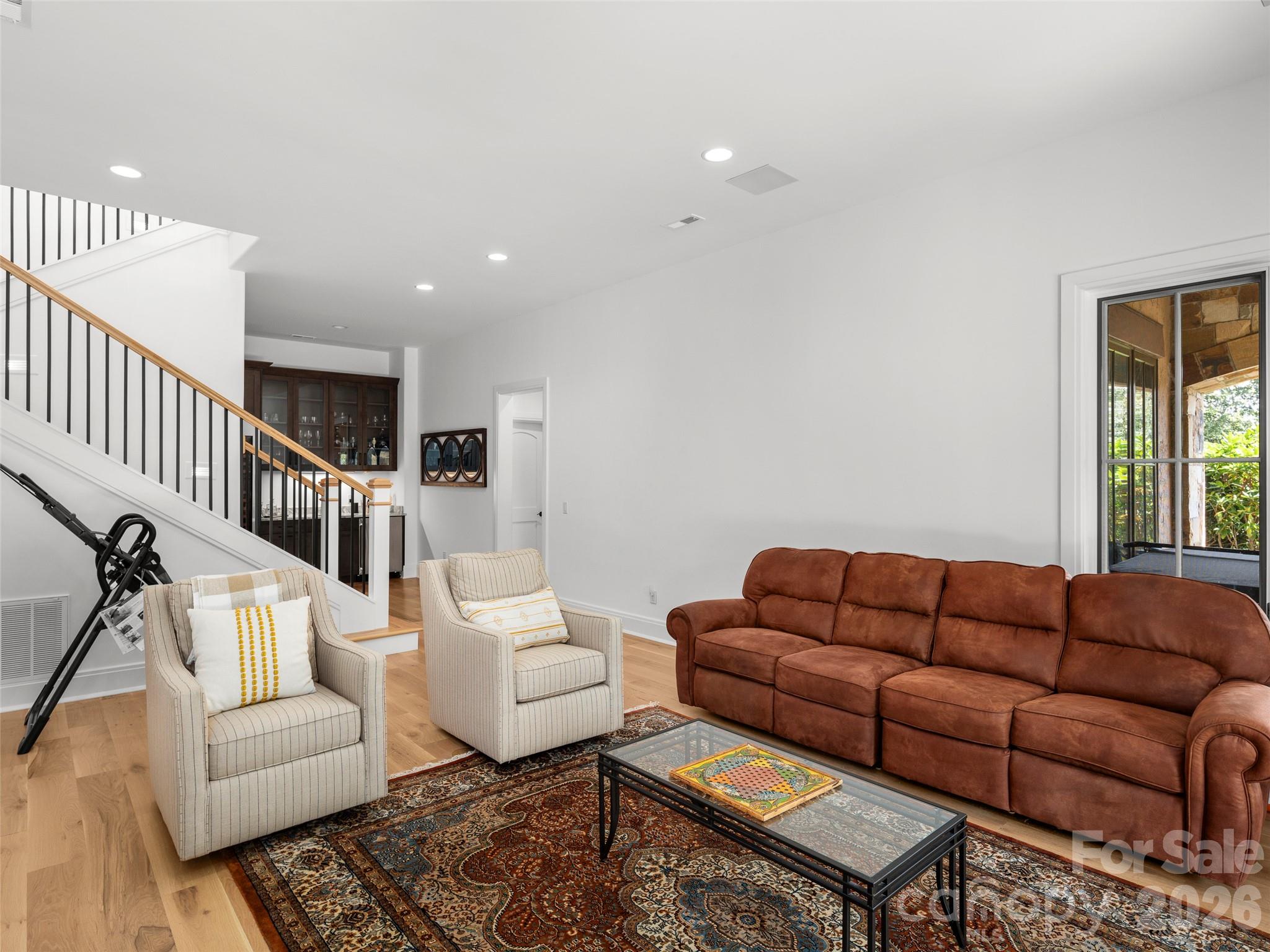 4 Windelsham Way Arden, NC 28704 - Photo 28 of 46 a living room with furniture a rug and a window