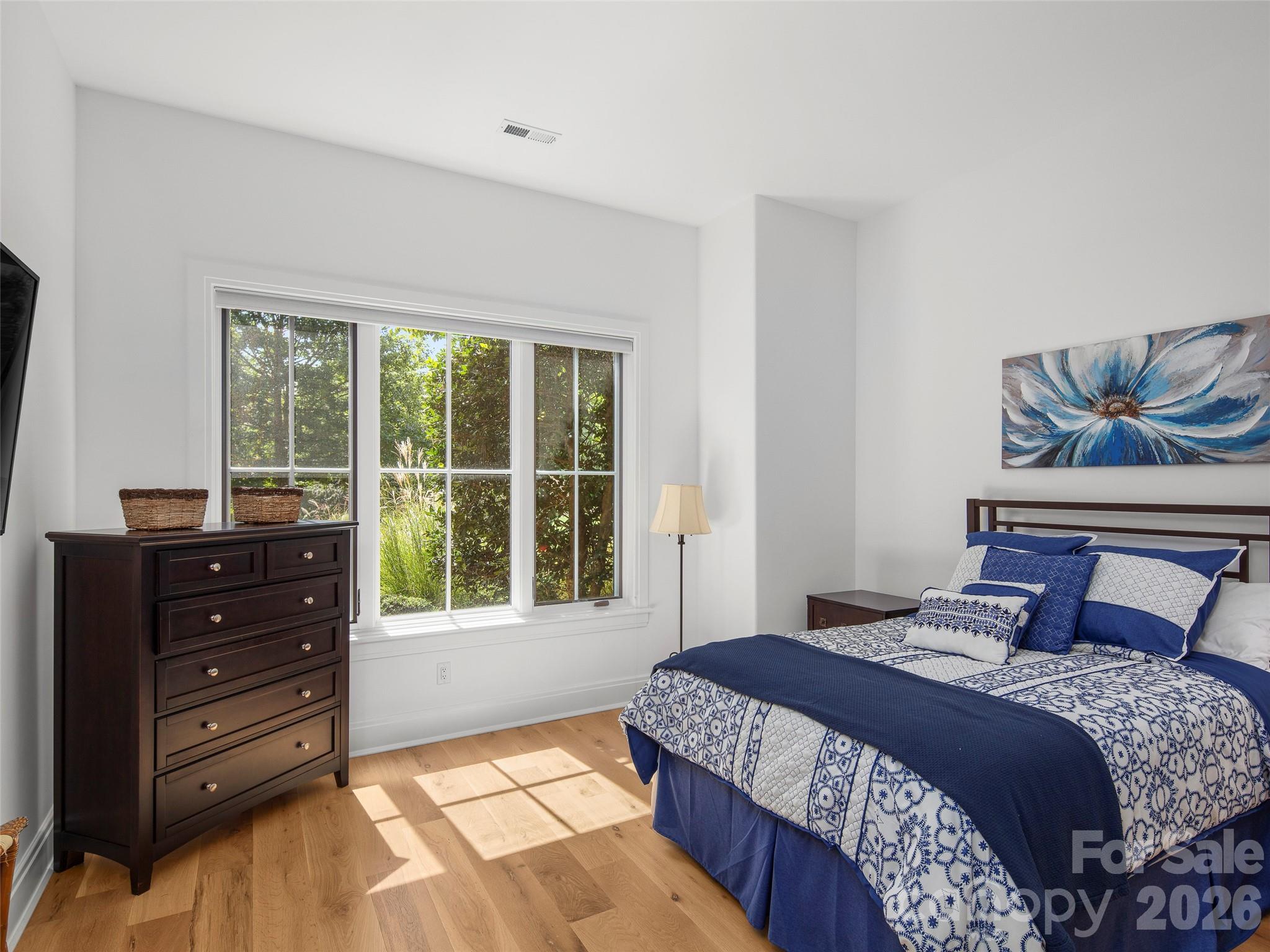 4 Windelsham Way Arden, NC 28704 - Photo 31 of 46 a bedroom with a bed and a window