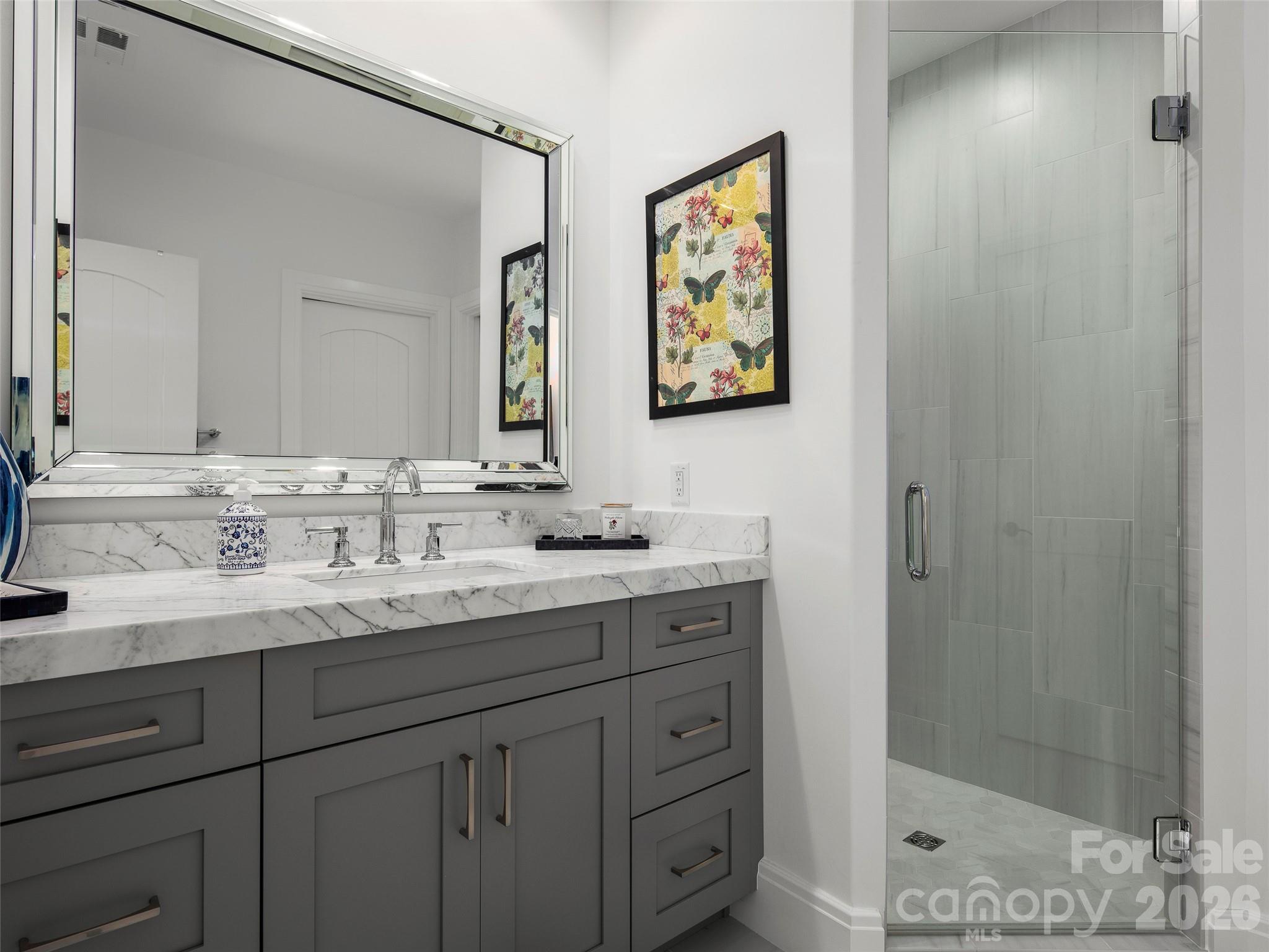 4 Windelsham Way Arden, NC 28704 - Photo 32 of 46 a bathroom with a granite countertop sink mirror and double