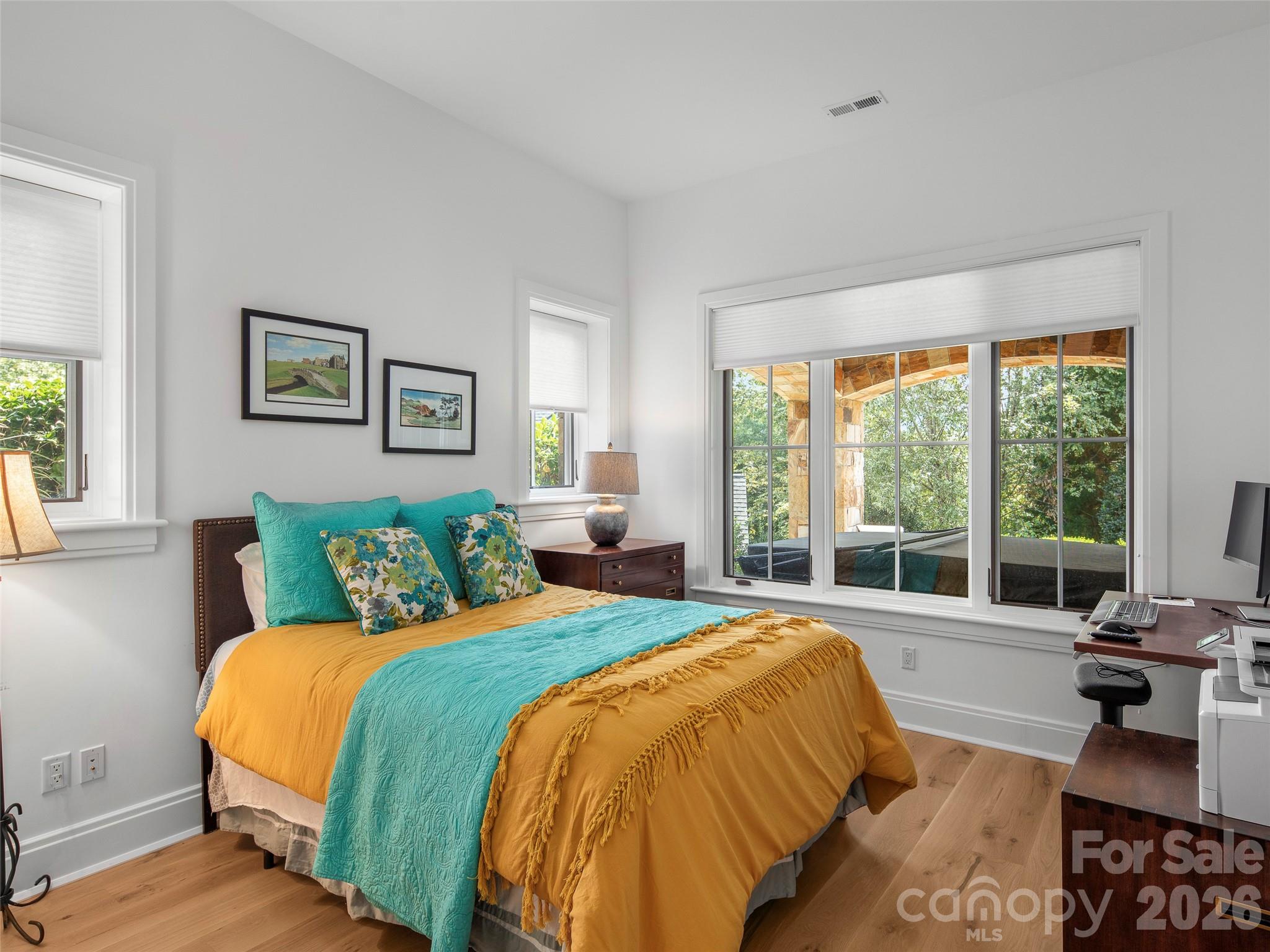 4 Windelsham Way Arden, NC 28704 - Photo 33 of 46 a bed sitting in a bedroom next to a large window