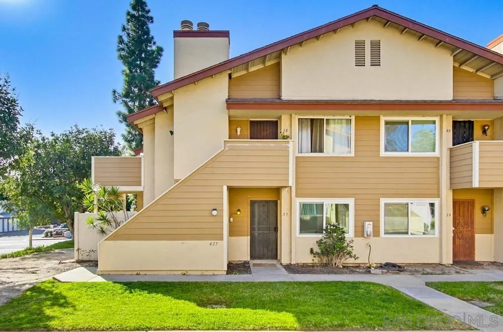 637 R Avenue, Unit 37 National City, CA 91950 - Photo 3 of 27 a front view of a house with a yard