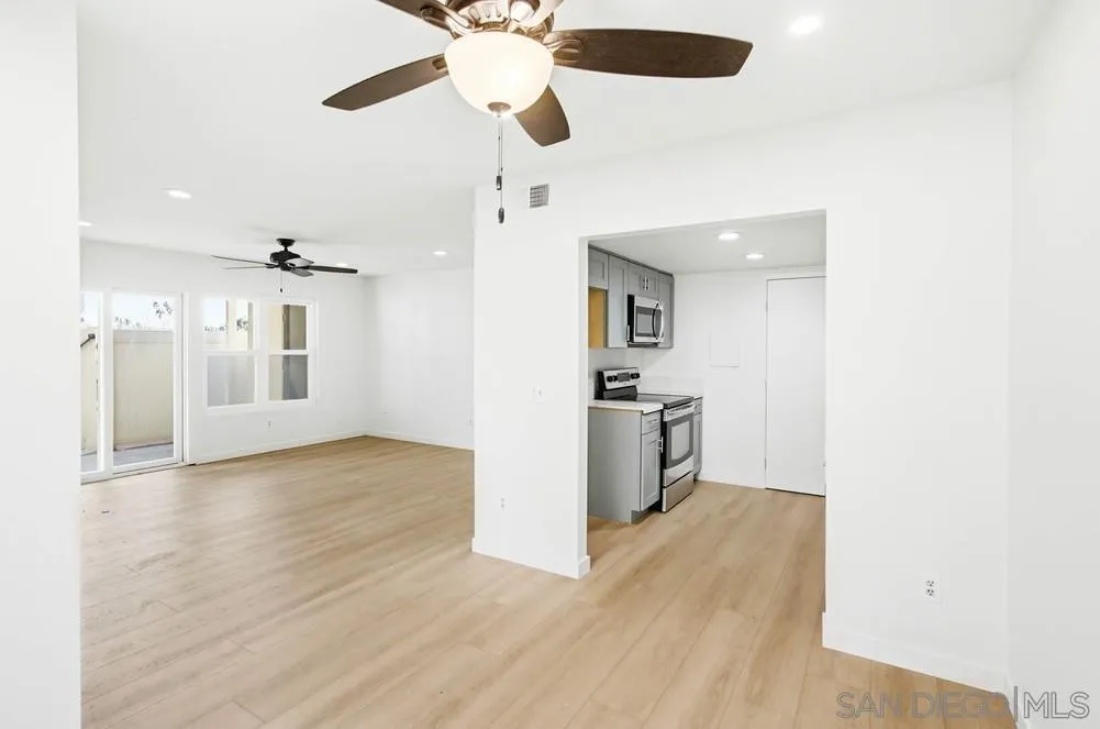 637 R Avenue, Unit 37 National City, CA 91950 - Photo 10 of 27 a view of a kitchen with a sink and a refrigerator