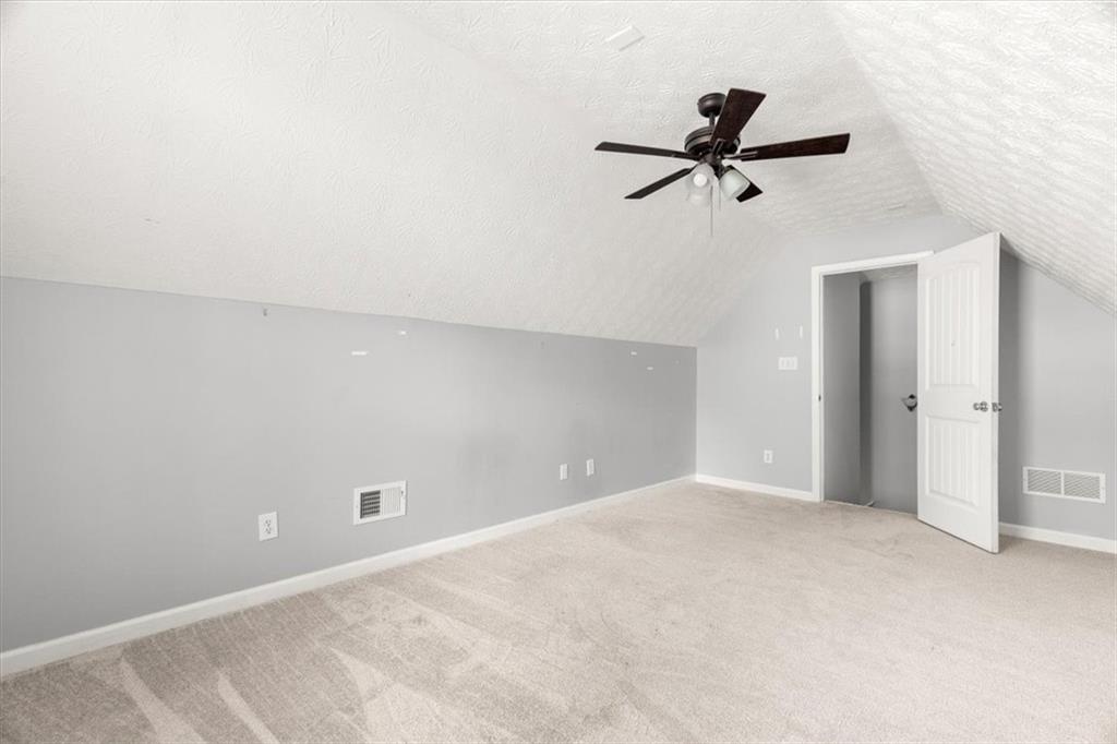 1022 Miss Amber Way Locust Grove, GA 30248 - Photo 28 of 43 a view of an empty room