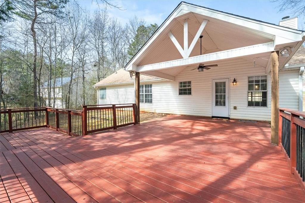 1022 Miss Amber Way Locust Grove, GA 30248 - Photo 32 of 43 a view of a house with a backyard