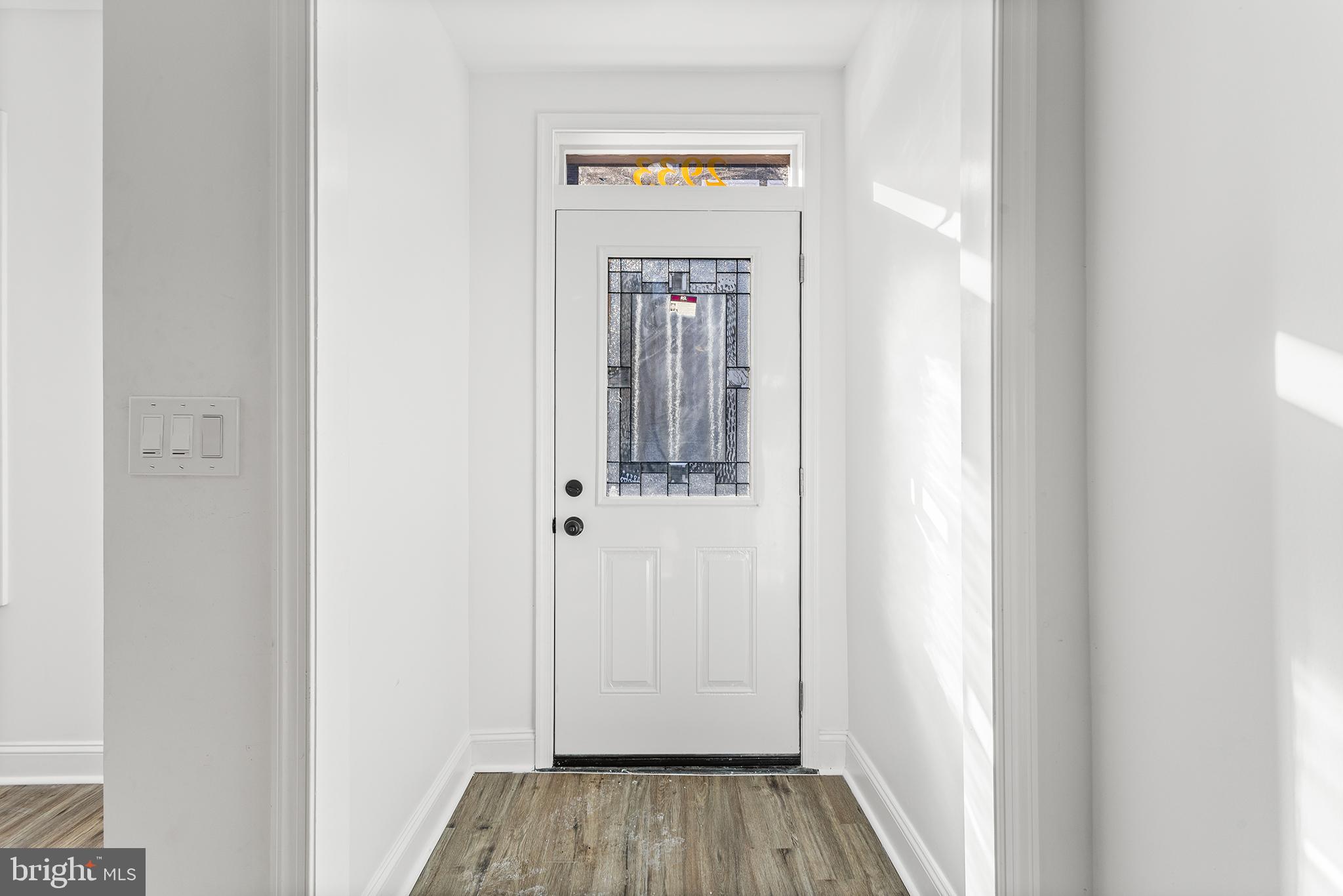 2933 Master Street Philadelphia, PA 19121 - Photo 12 of 28 a view of a hallway with wooden floor