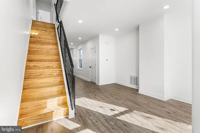 a view of entryway with wooden floor