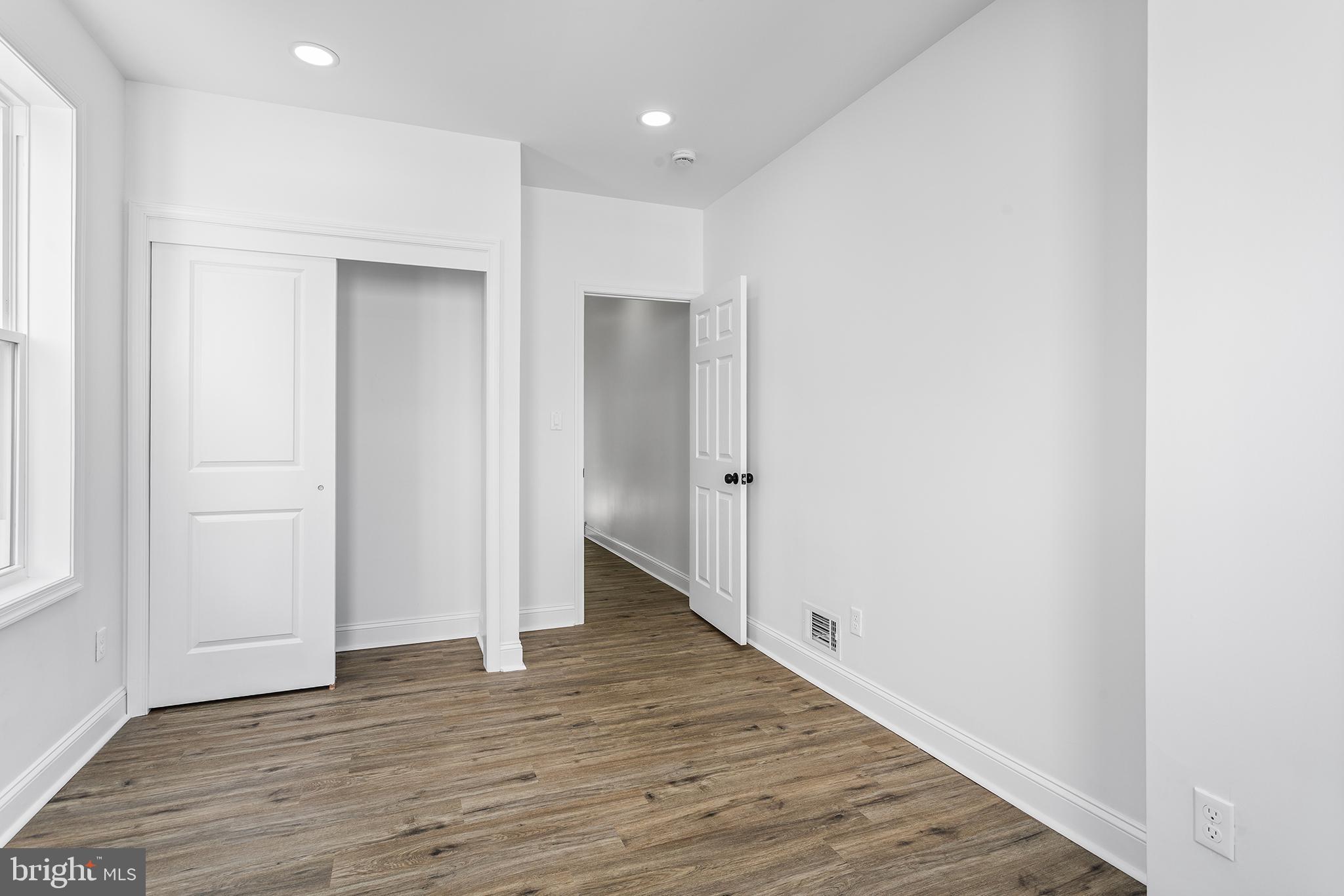 2933 Master Street Philadelphia, PA 19121 - Photo 21 of 28 a view of an empty room with wooden floor