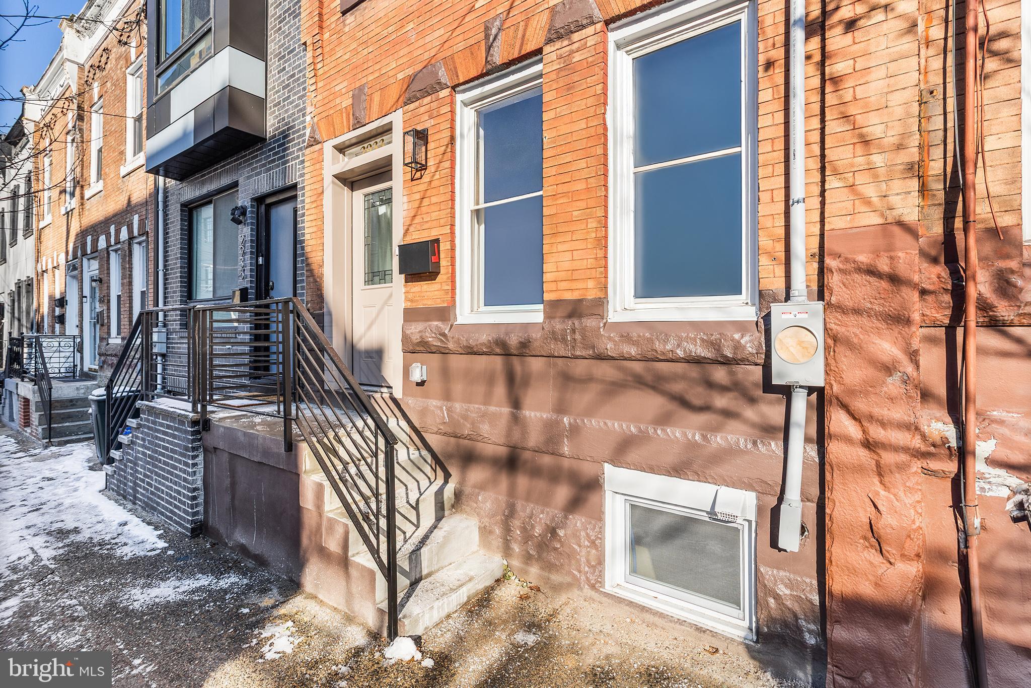 2933 Master Street Philadelphia, PA 19121 - Photo 26 of 28 a view of front door of house with stairs