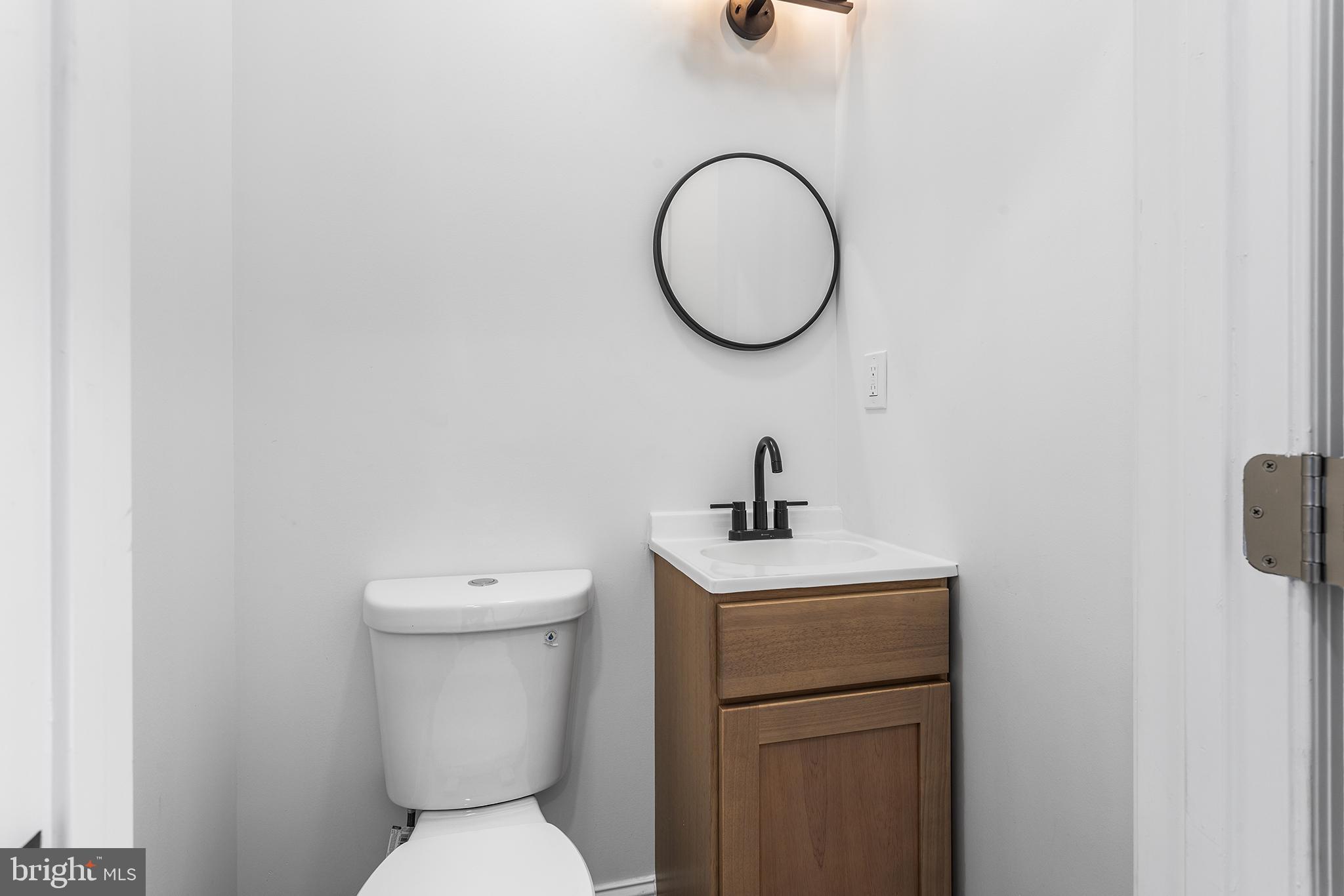 2933 Master Street Philadelphia, PA 19121 - Photo 7 of 28 a bathroom with a toilet and a sink