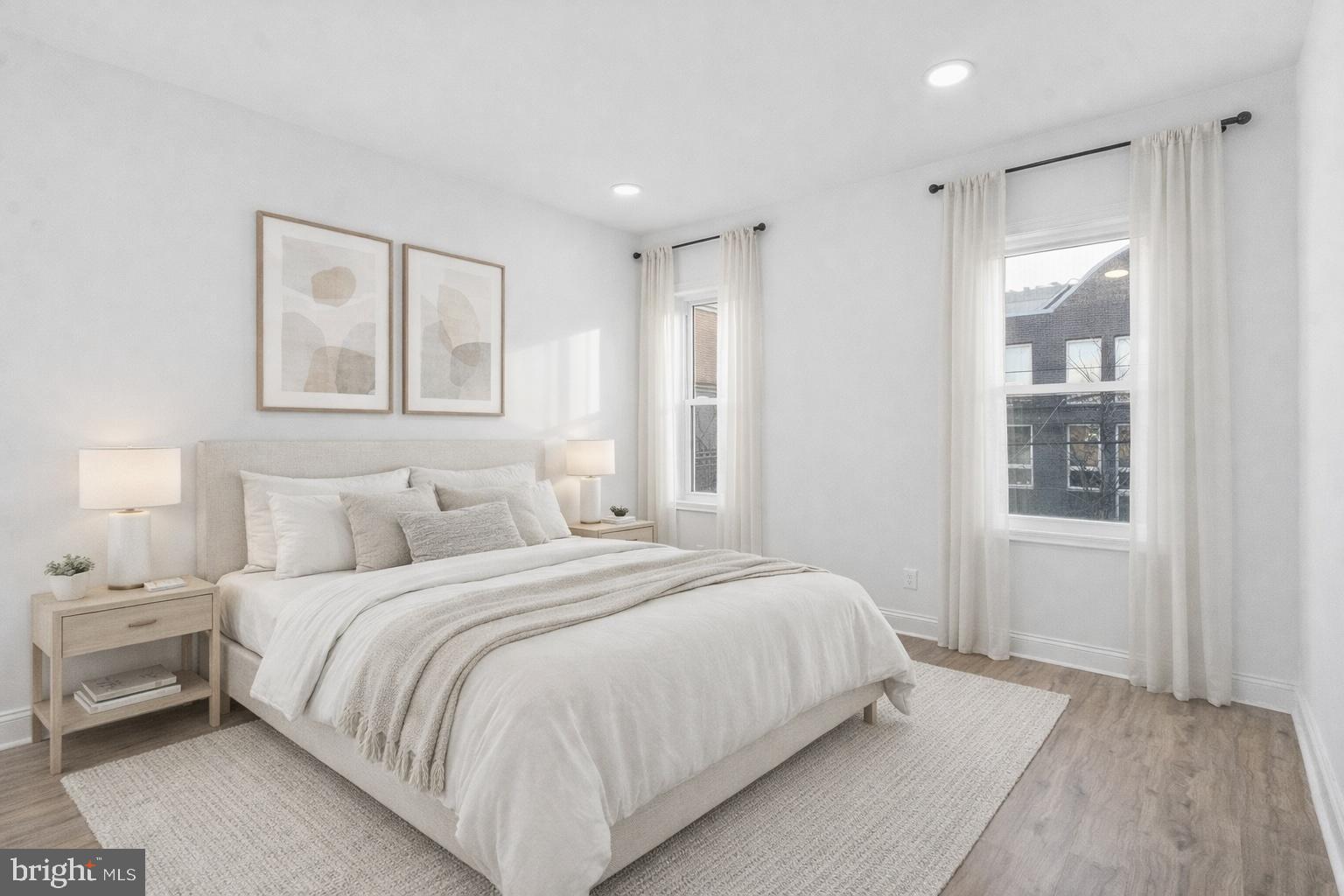 2933 Master Street Philadelphia, PA 19121 - Photo 8 of 28 a bedroom with a large bed and a window