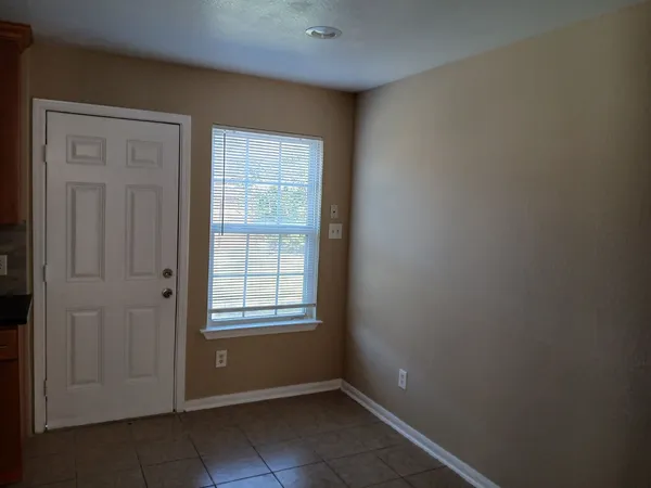 a view of an empty room with window