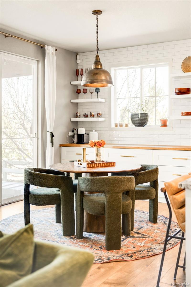 683 Tiger Lily Way Highlands Ranch, CO 80126 - Photo 11 of 50 a kitchen with a stove a sink and a refrigerator