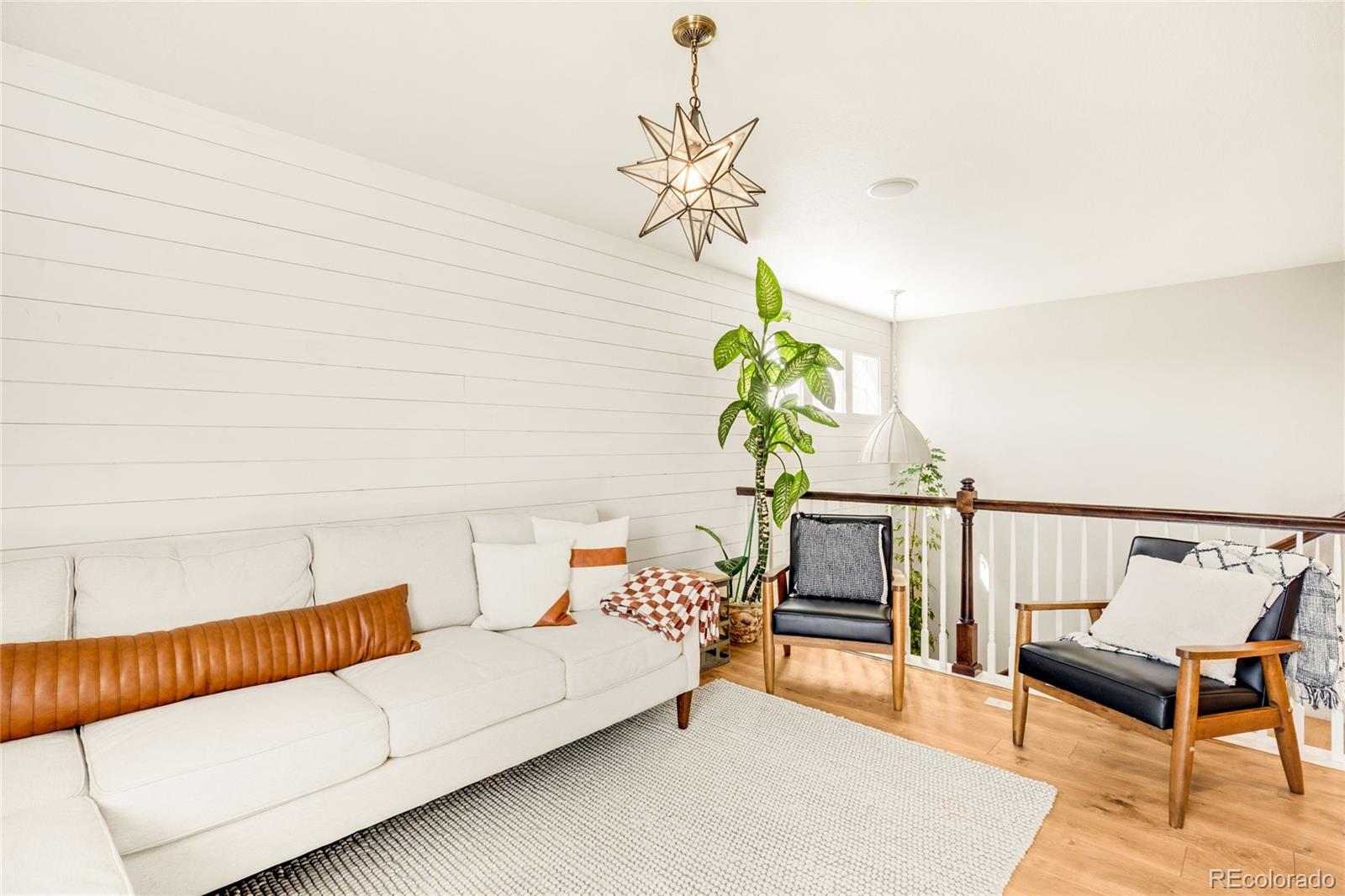 683 Tiger Lily Way Highlands Ranch, CO 80126 - Photo 22 of 50 a living room with furniture