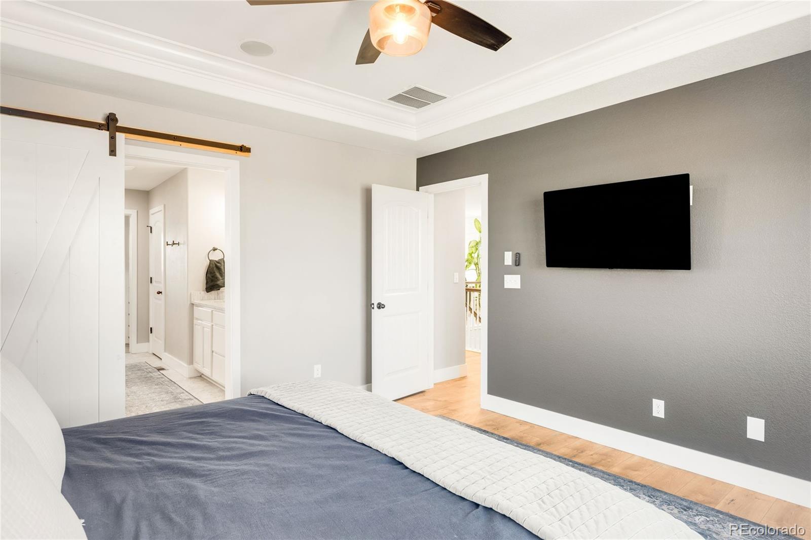 683 Tiger Lily Way Highlands Ranch, CO 80126 - Photo 26 of 50 a view of a livingroom with a flat screen tv