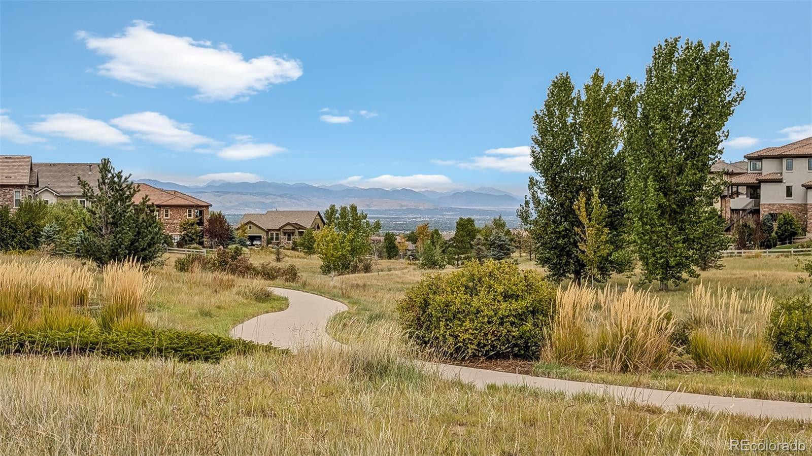683 Tiger Lily Way Highlands Ranch, CO 80126 - Photo 48 of 50 a view of a lake view