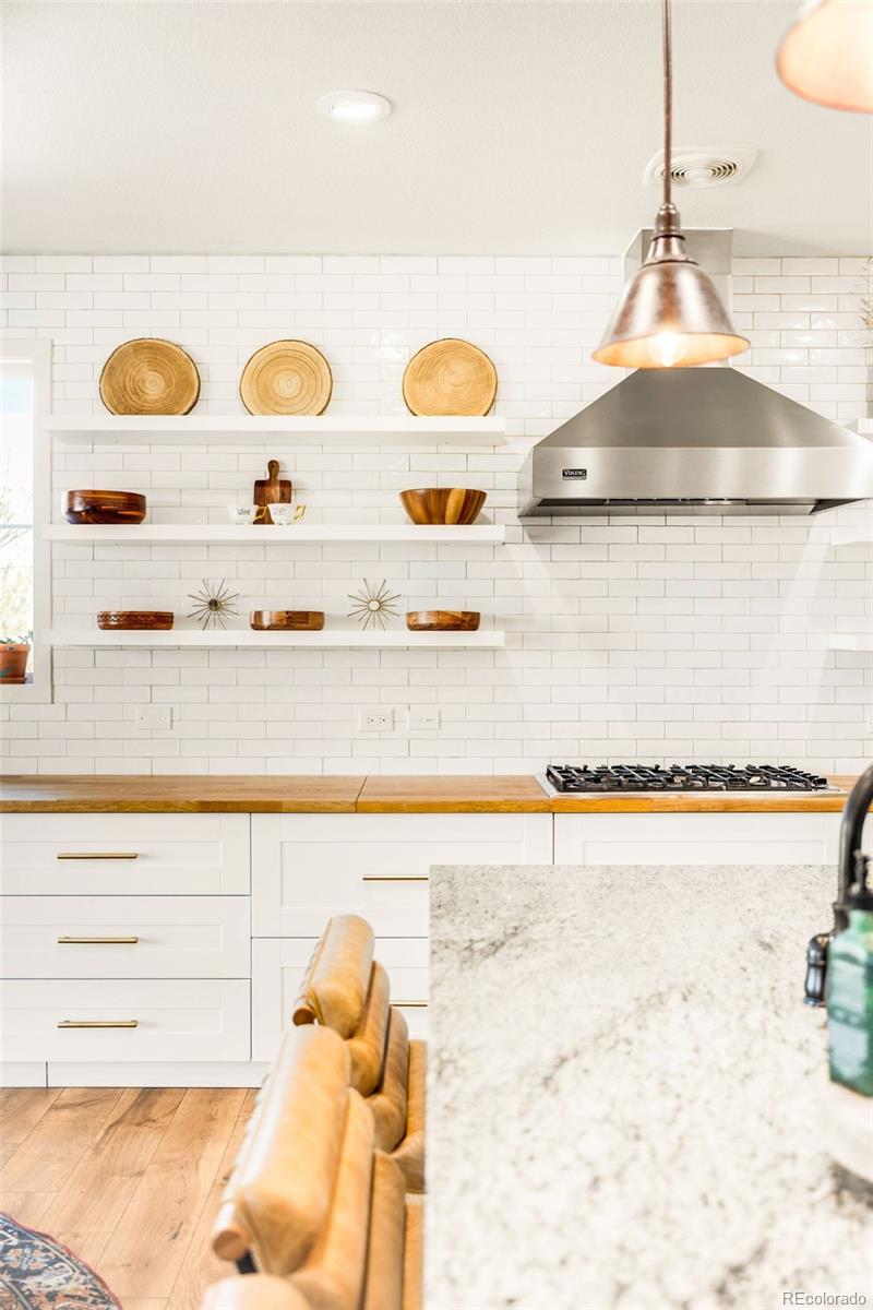 683 Tiger Lily Way Highlands Ranch, CO 80126 - Photo 6 of 50 a bathroom with a sink mirror and vanity