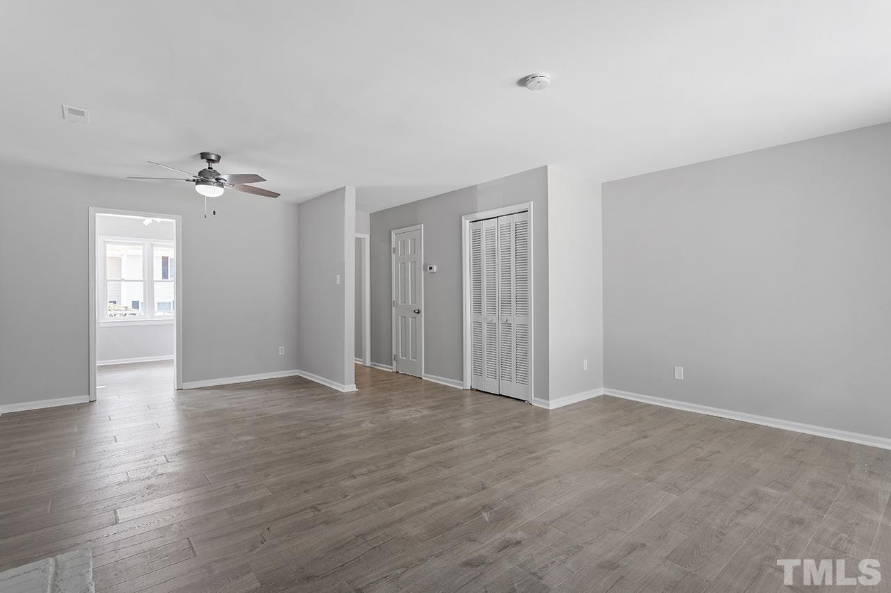 1404 Kent Road Raleigh, NC 27606 - Photo 12 of 28 a view of an empty room with a window