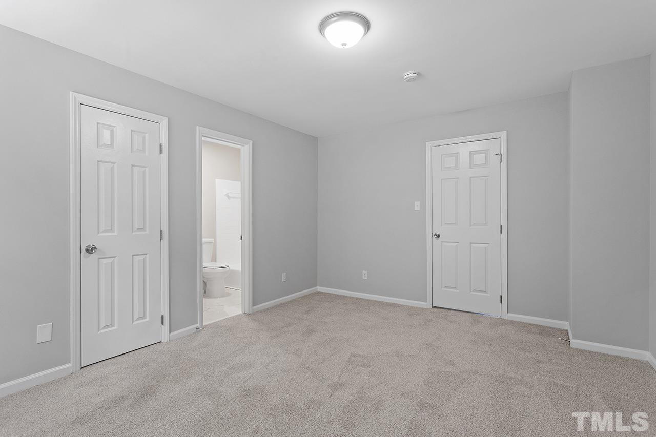 1404 Kent Road Raleigh, NC 27606 - Photo 17 of 28 a view of an empty room and closet area