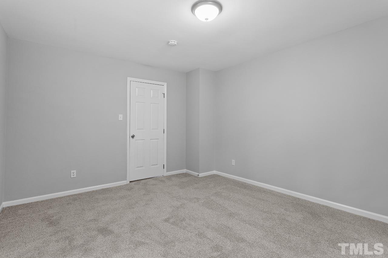1404 Kent Road Raleigh, NC 27606 - Photo 18 of 28 a view of an empty room