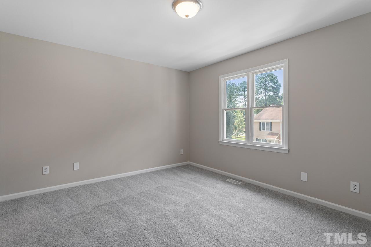 1404 Kent Road Raleigh, NC 27606 - Photo 21 of 28 an empty room with windows and closet