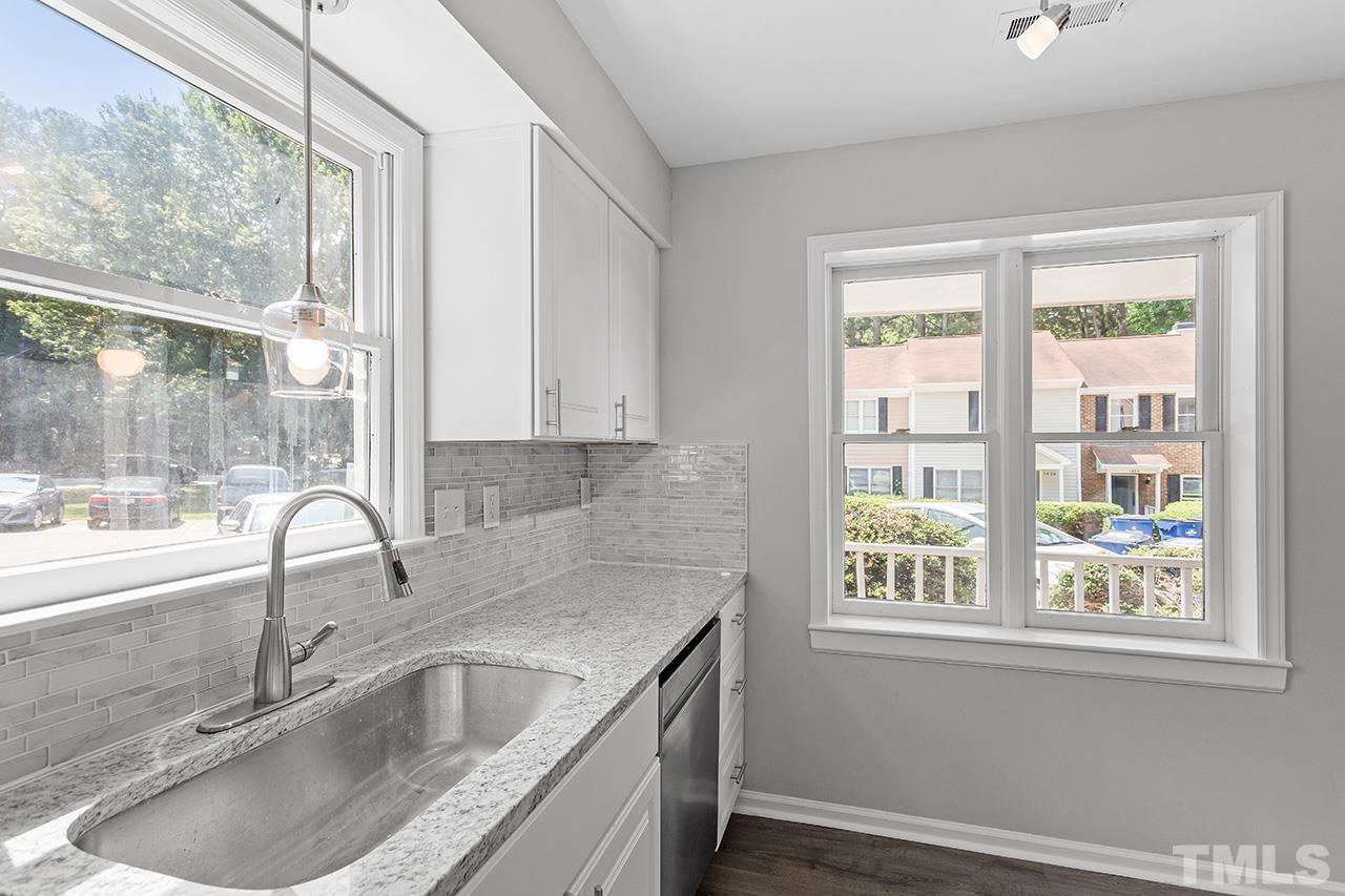 1404 Kent Road Raleigh, NC 27606 - Photo 8 of 28 a close view of a sink and a window