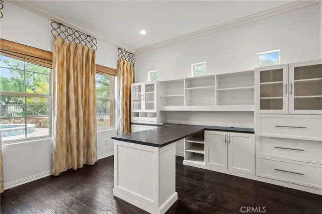 a room with furniture and window