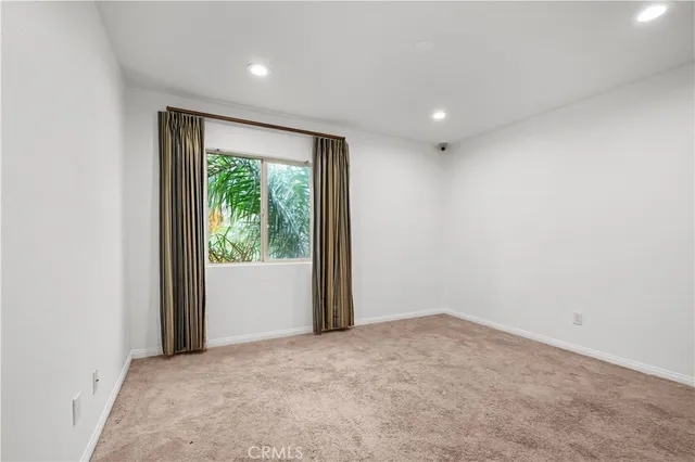 a view of hallway with a large window