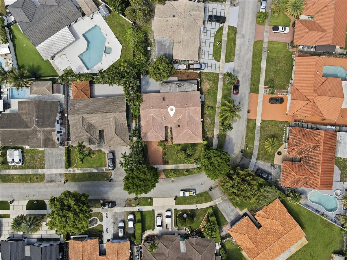 20009 Northwest 66th Place Hialeah, FL 33015 - Photo 33 of 33 an aerial view of residential houses with outdoor space