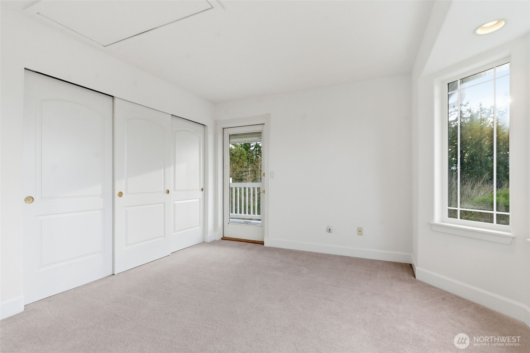 457 East Victor Road Belfair, WA 98528 - Photo 19 of 40 a view of an empty room with a window