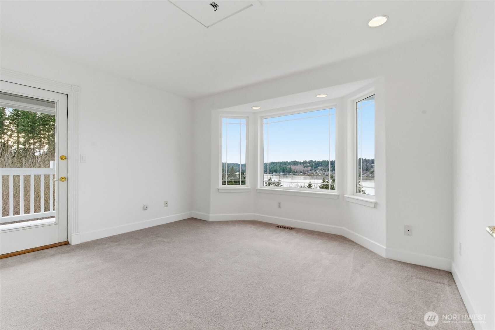 457 East Victor Road Belfair, WA 98528 - Photo 20 of 40 an empty room with a window