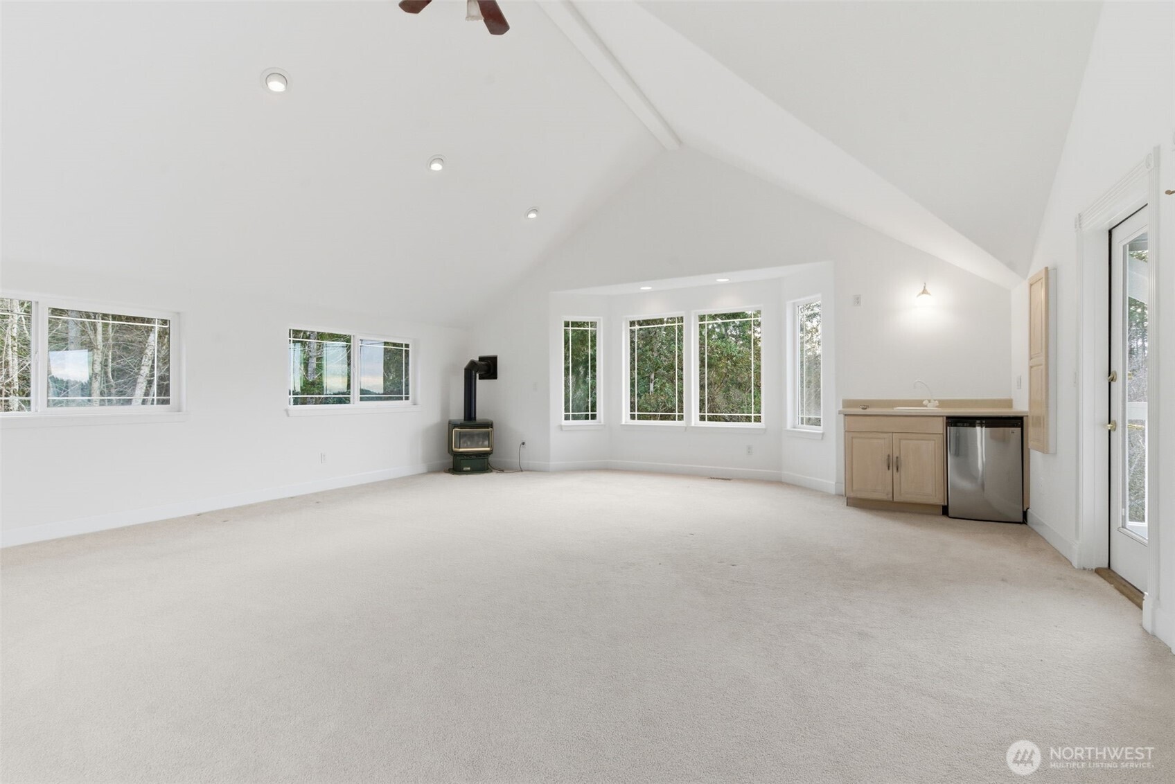 457 East Victor Road Belfair, WA 98528 - Photo 24 of 40 a view of an empty room with a window