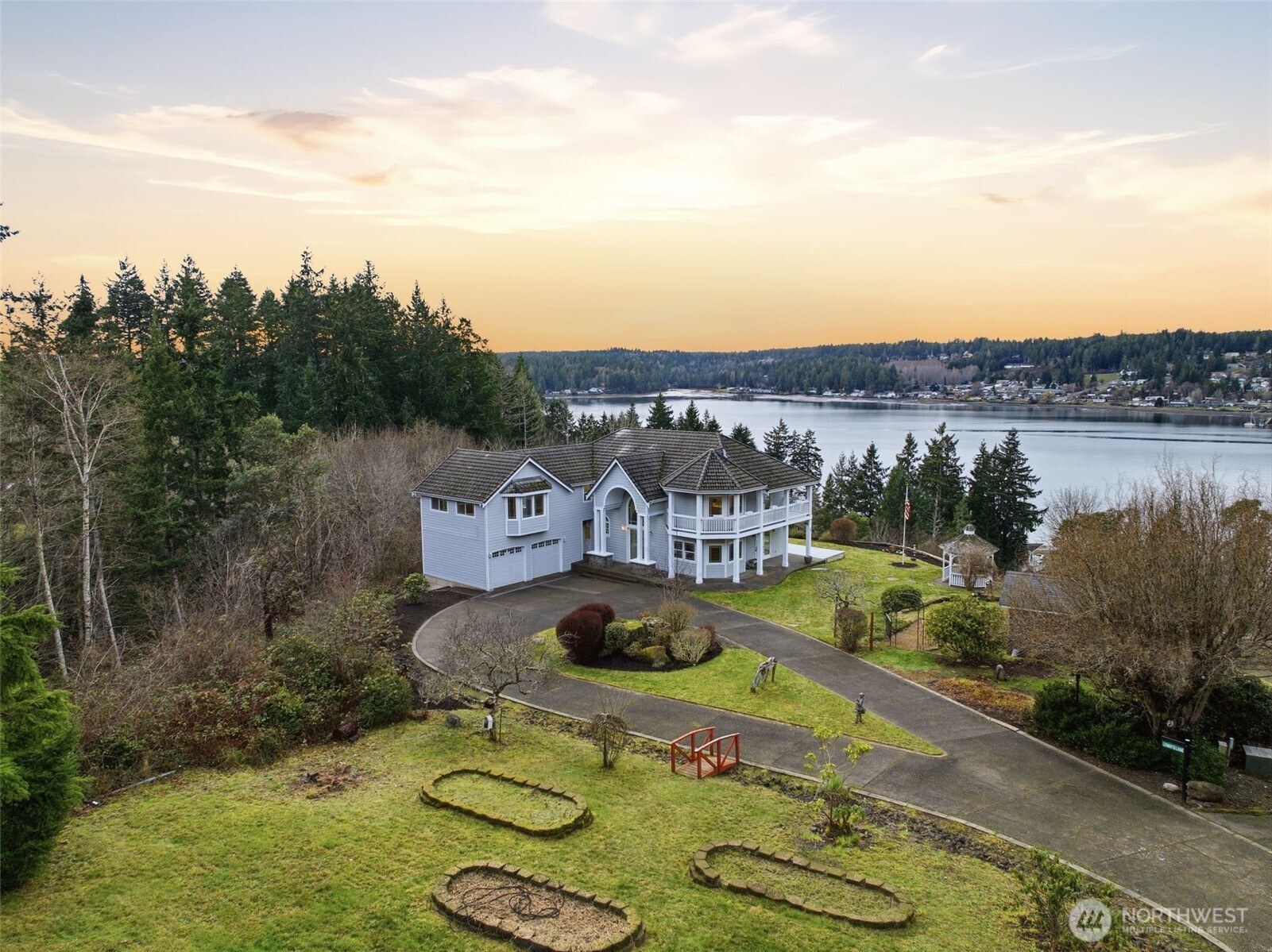 457 East Victor Road Belfair, WA 98528 - Photo 4 of 40 a view of a house with pool and a yard