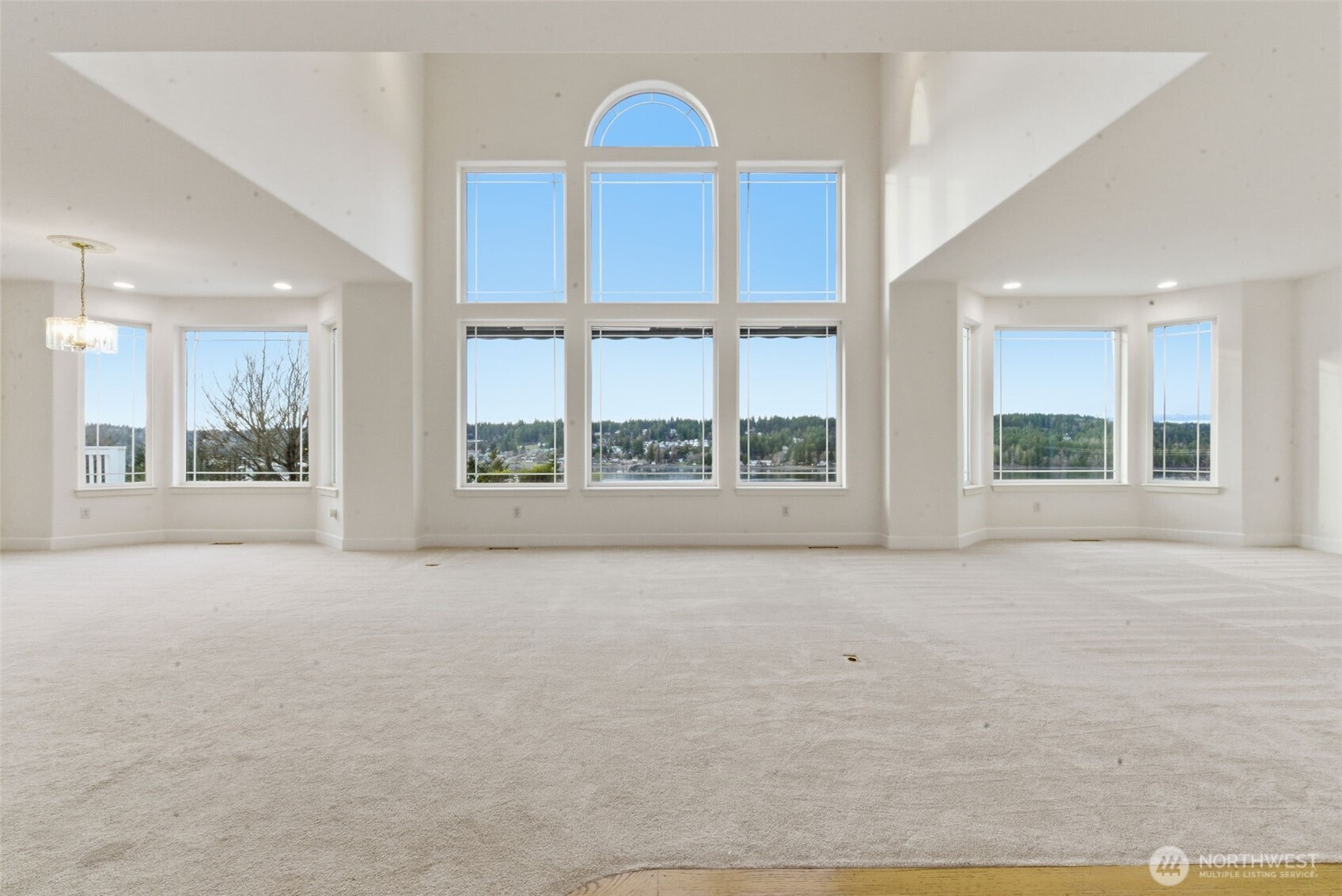 457 East Victor Road Belfair, WA 98528 - Photo 8 of 40 a view of an empty room with a window